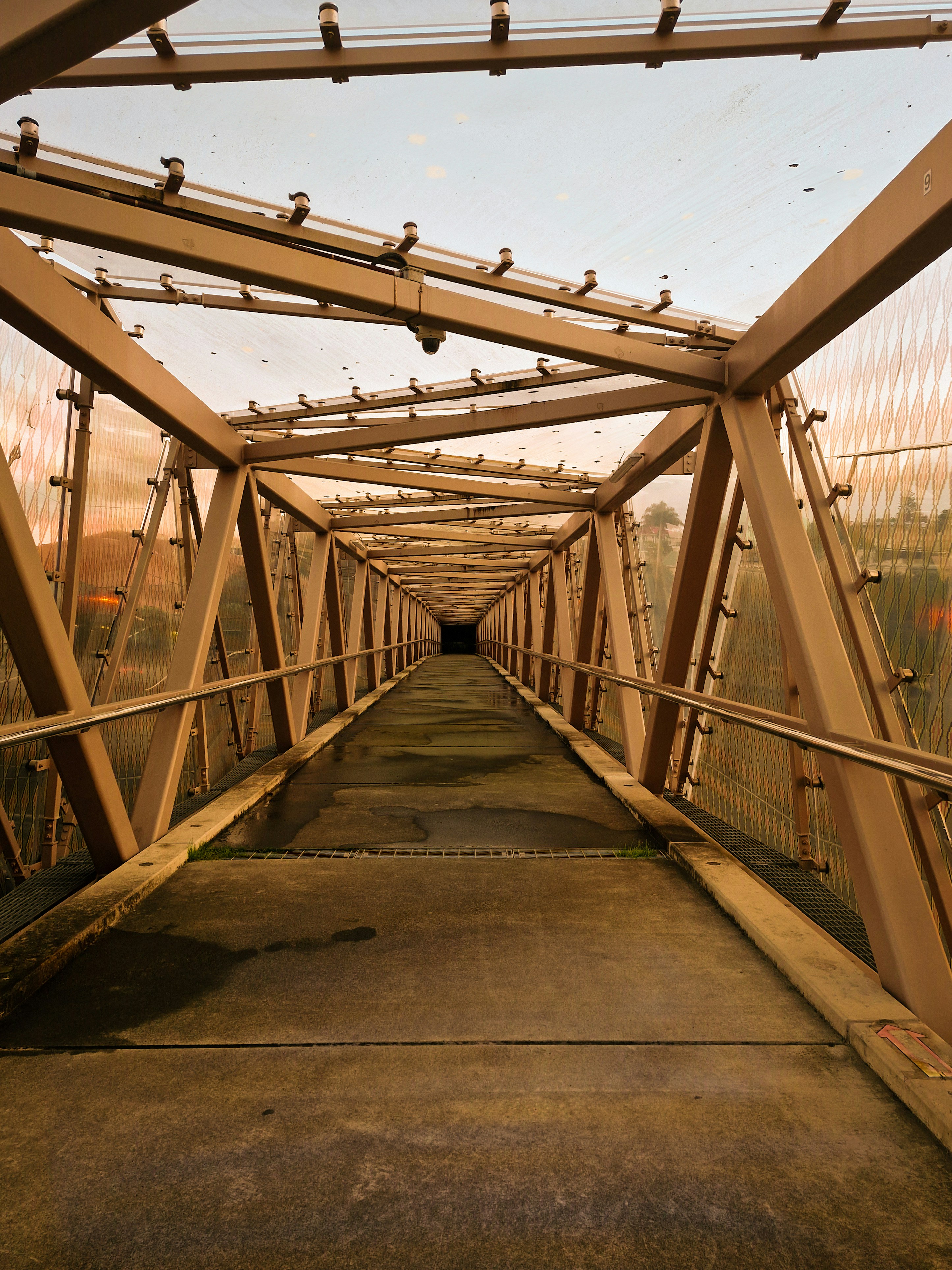 A bridge that has a long walkway going across it