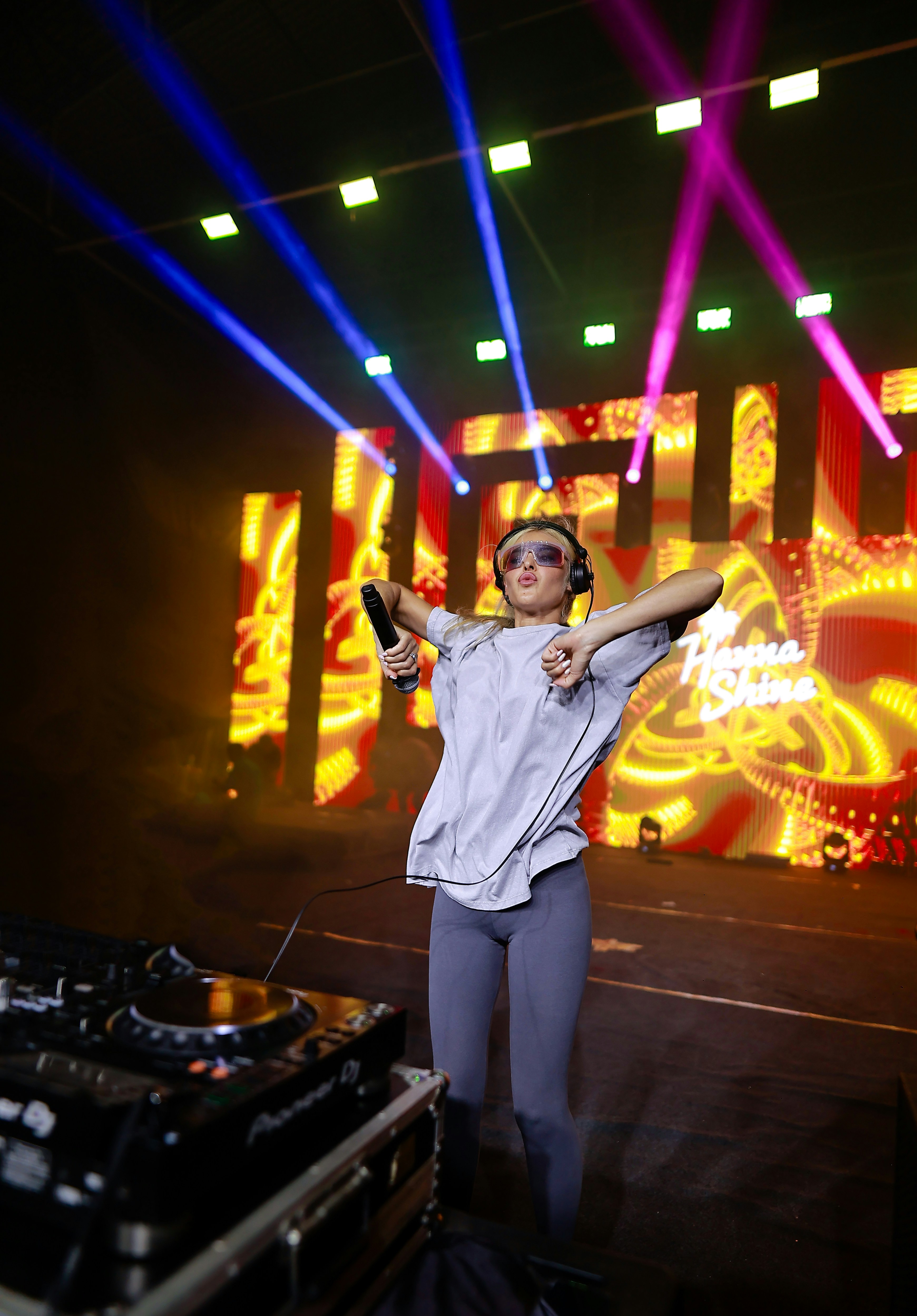 A man standing in front of a dj set