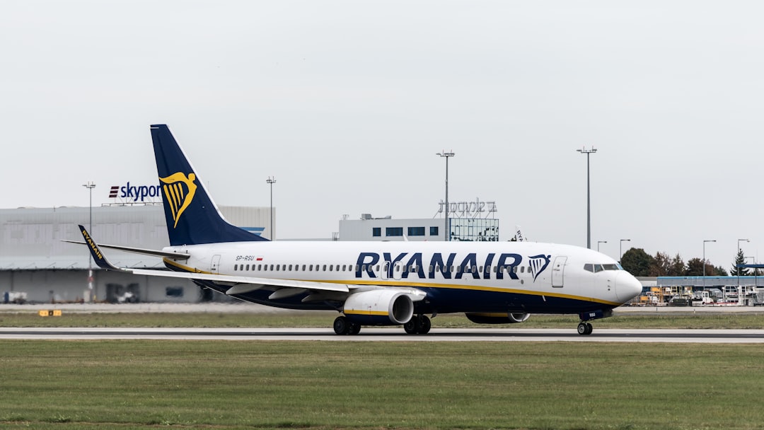 A large jetliner sitting on top of an airport runway,