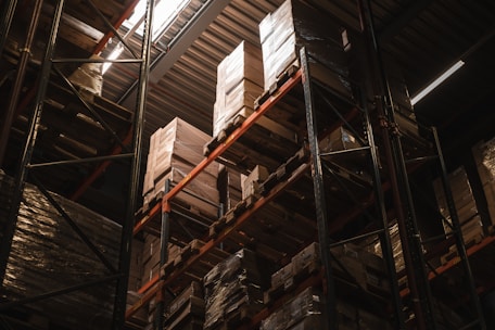 A large stack of boxes in a warehouse
