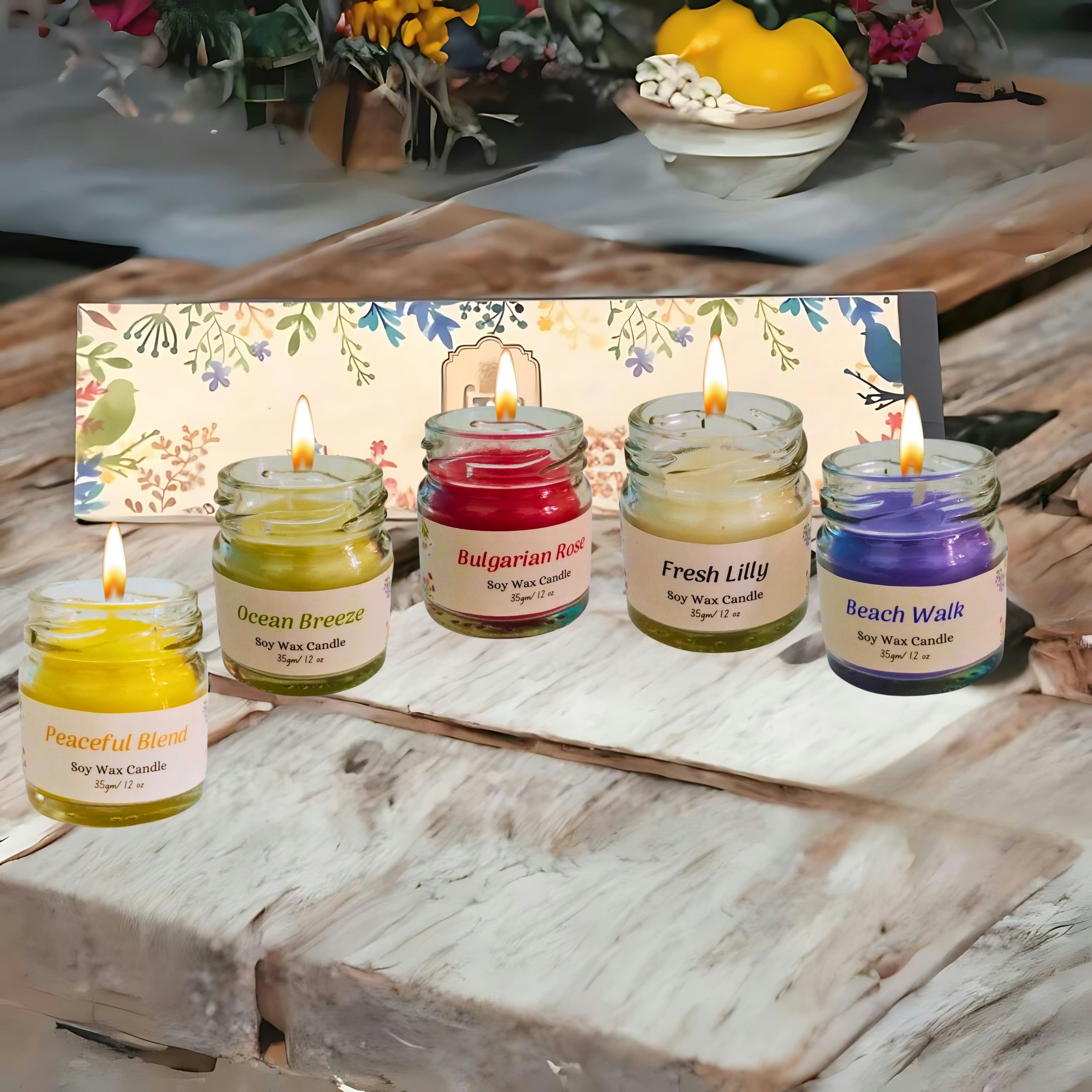 A group of candles sitting on top of a wooden table