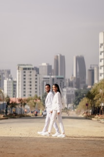 A couple of people that are standing in the dirt