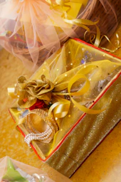 A box with a ring inside of it on a table