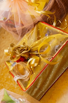 A box with a ring inside of it on a table