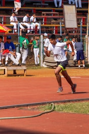 A man playing tennis on a tennis court