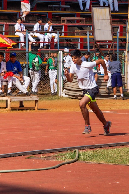 A man playing tennis on a tennis court