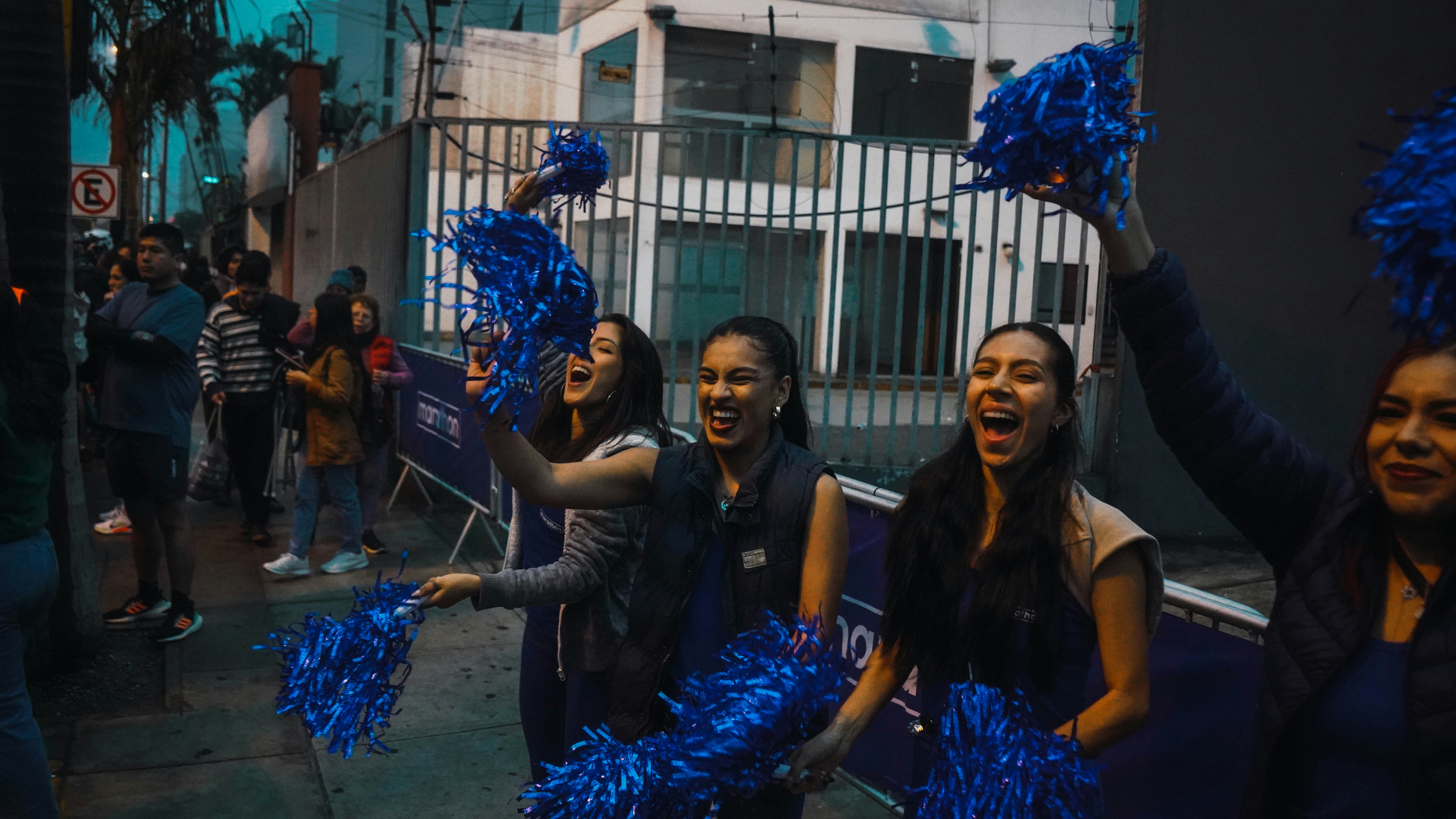 woman wearing yellow long-sleeved dress under white clouds and blue sky during daytime