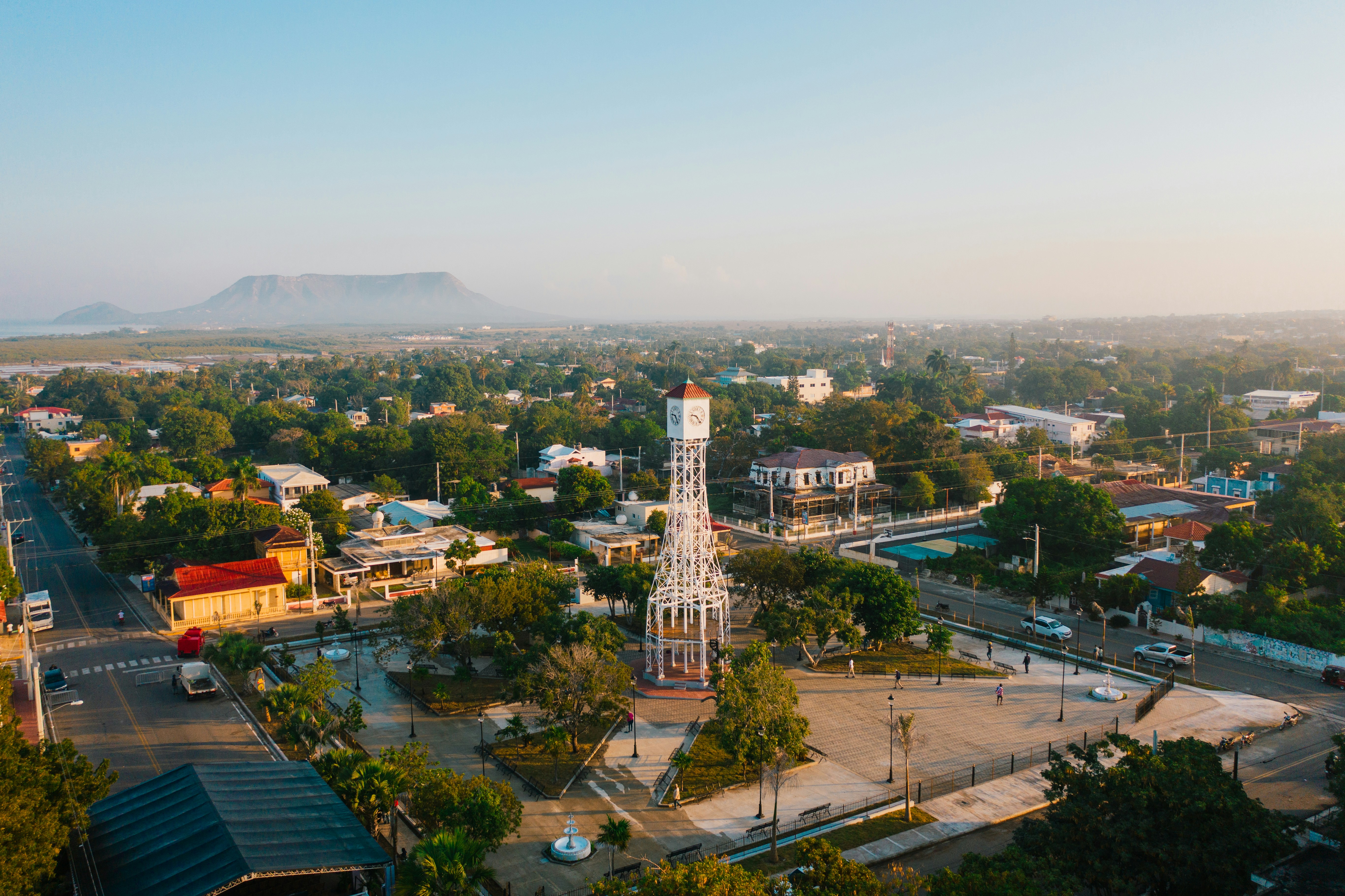 An aerial view of a town with a clock tower