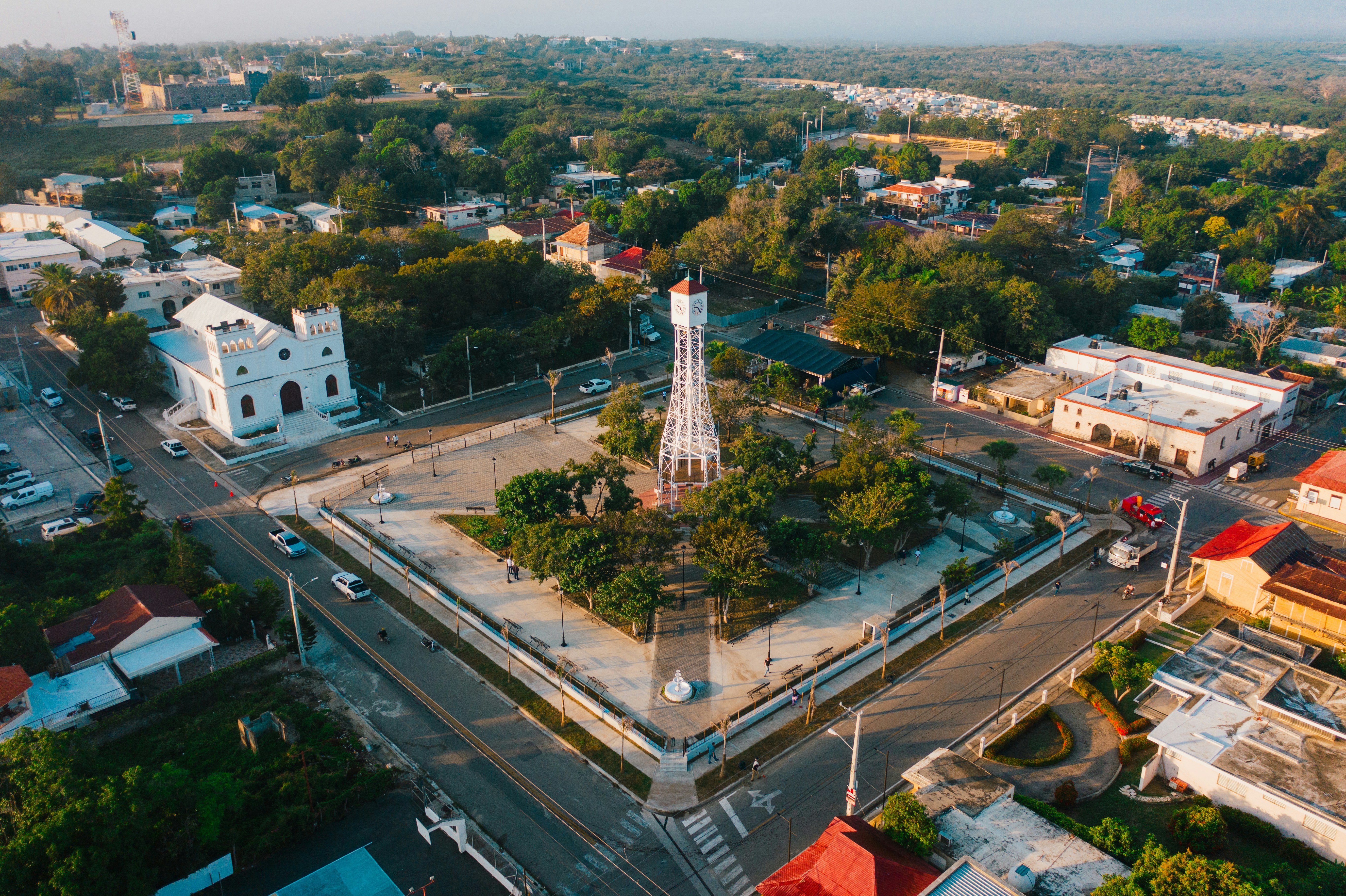 An aerial view of a town with a clock tower