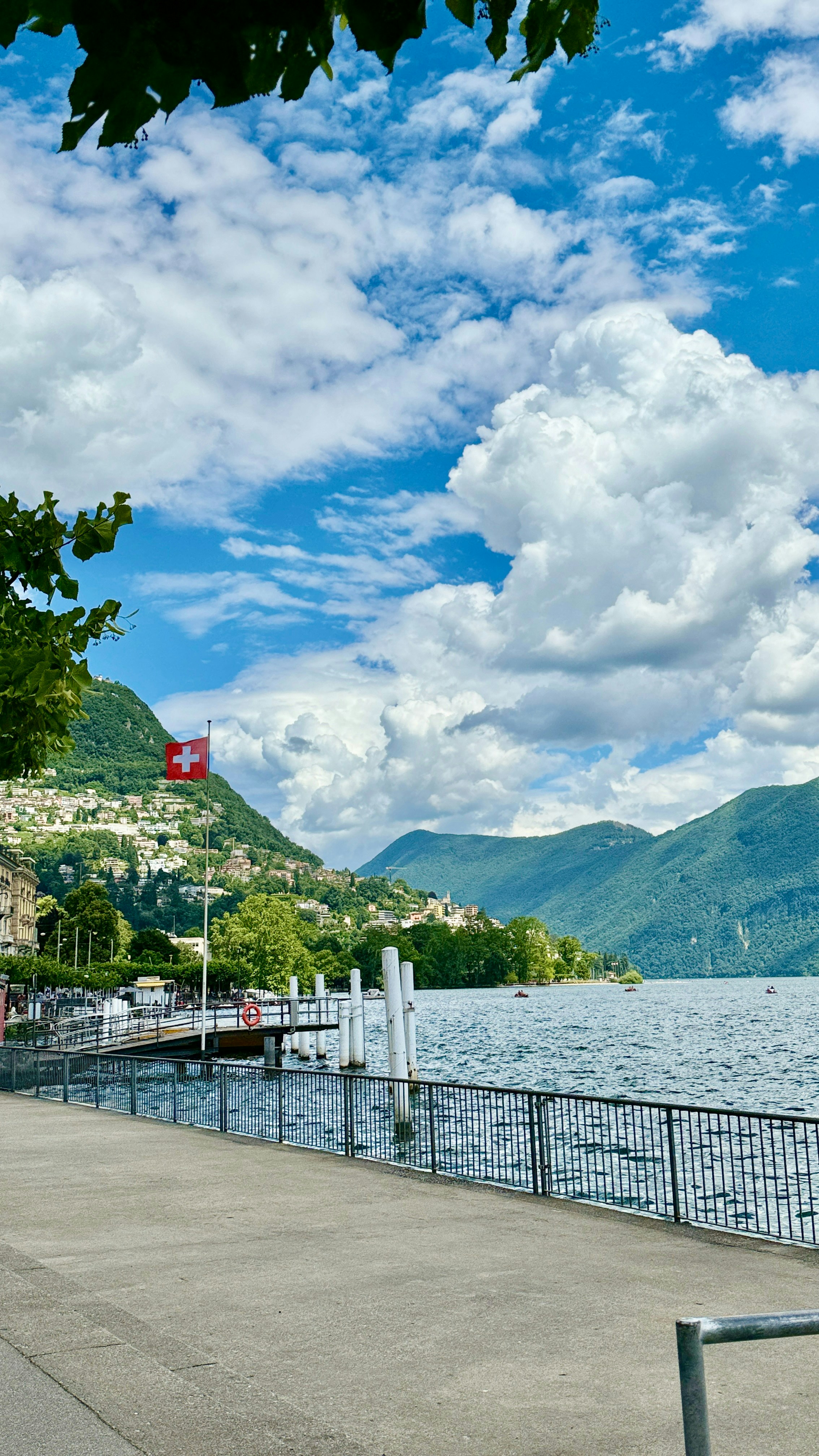 A view of a body of water with mountains in the background
