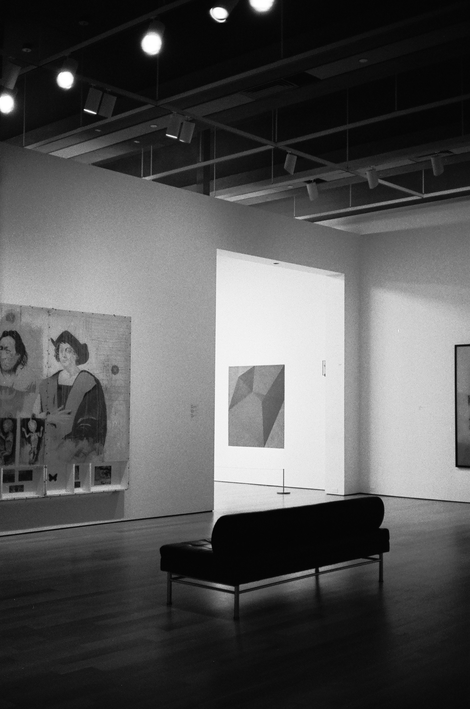 A black and white photo of an art gallery