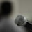 A close up of a microphone with a blurry background