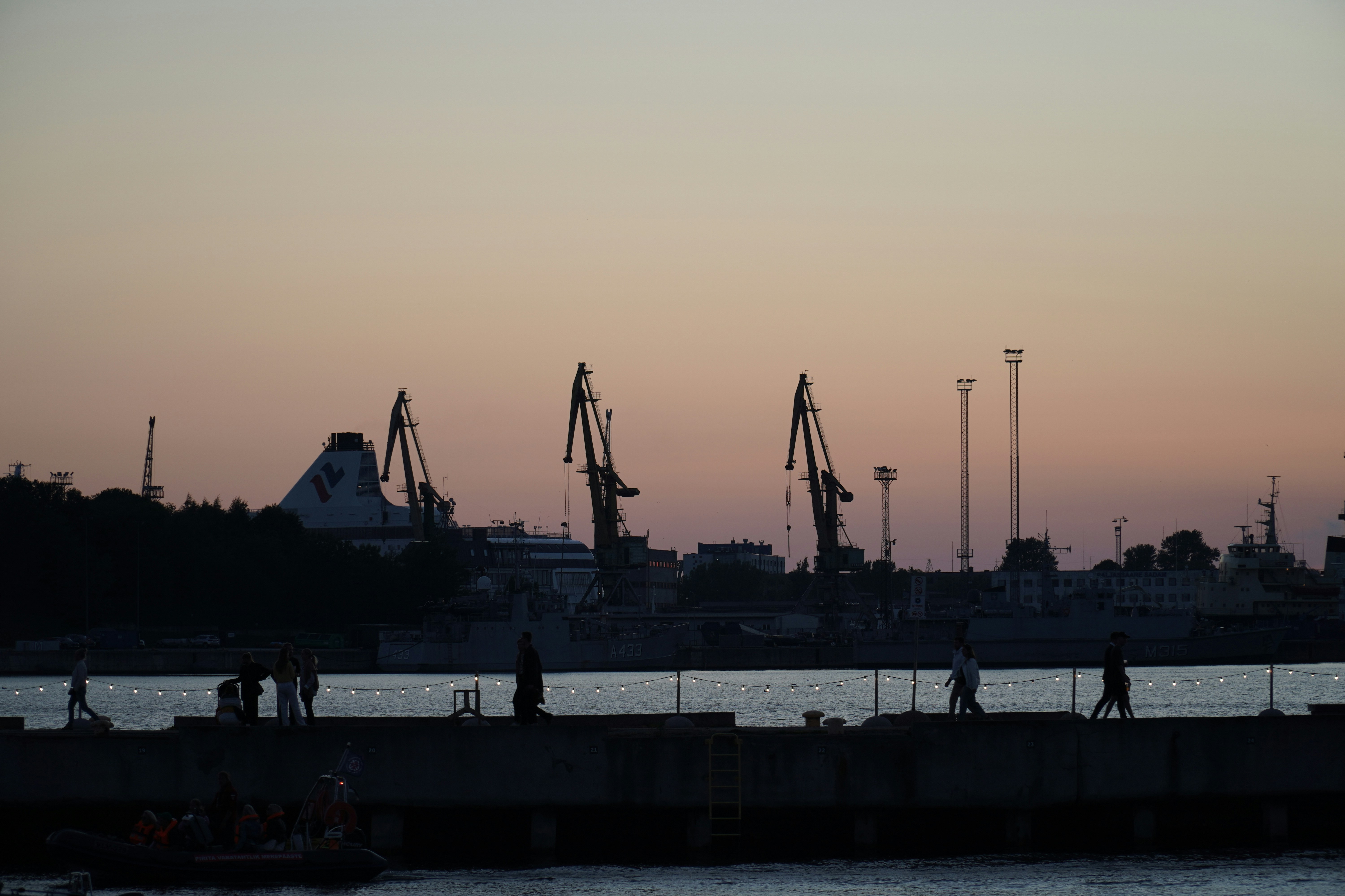 A body of water that has some boats in it