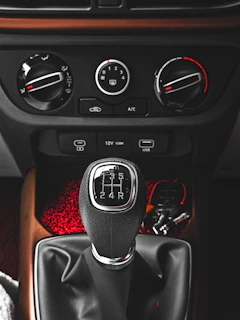 The interior of a car with a steering wheel