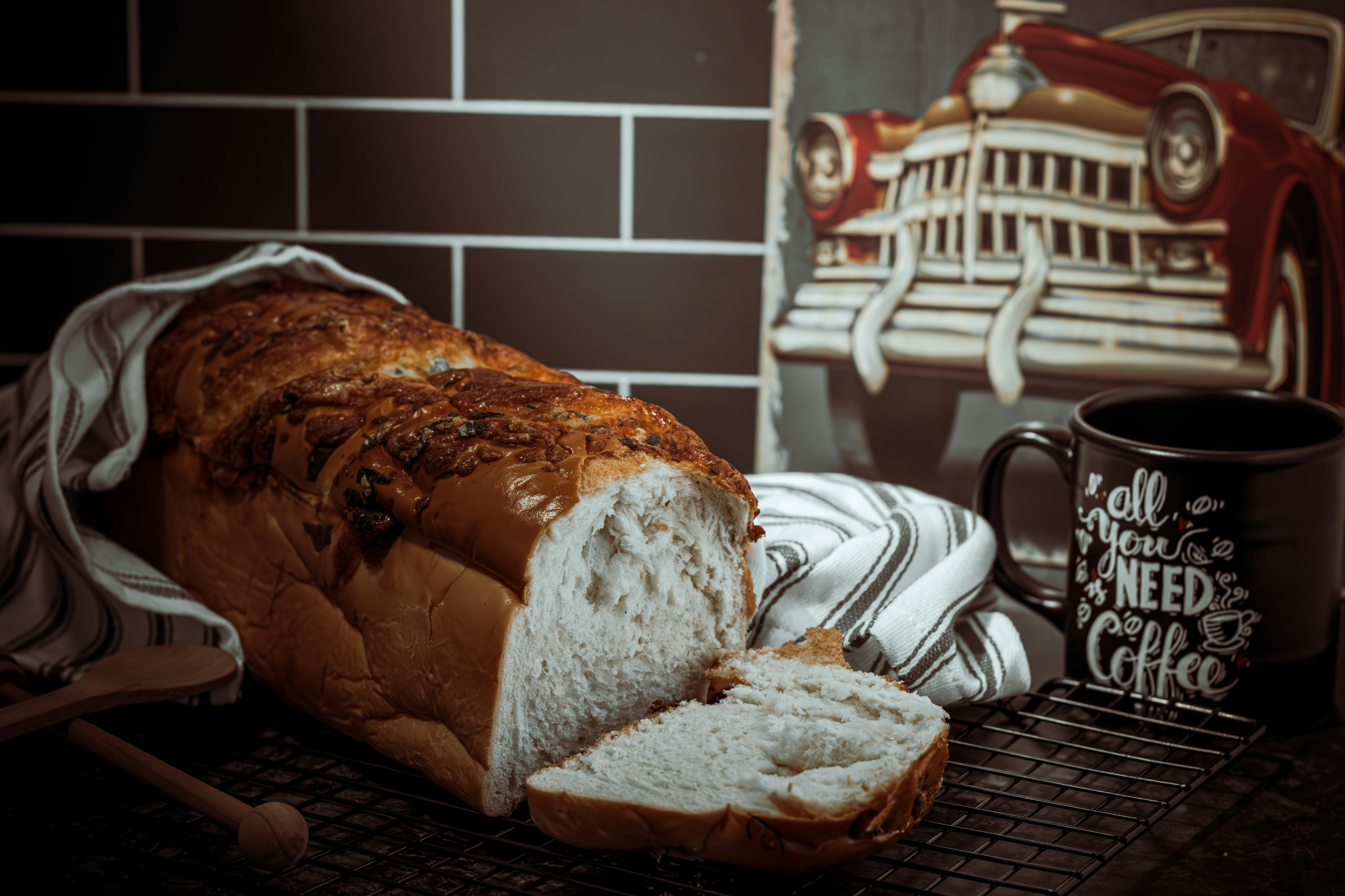 A loaf of bread sitting on top of a cooling rack