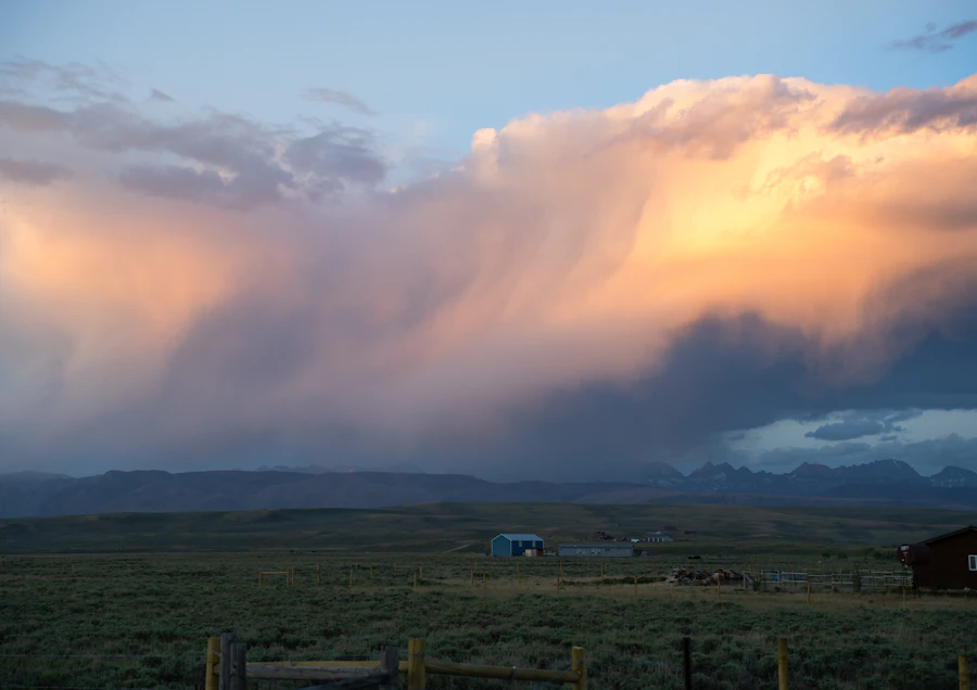 Cloud looming over farmland
