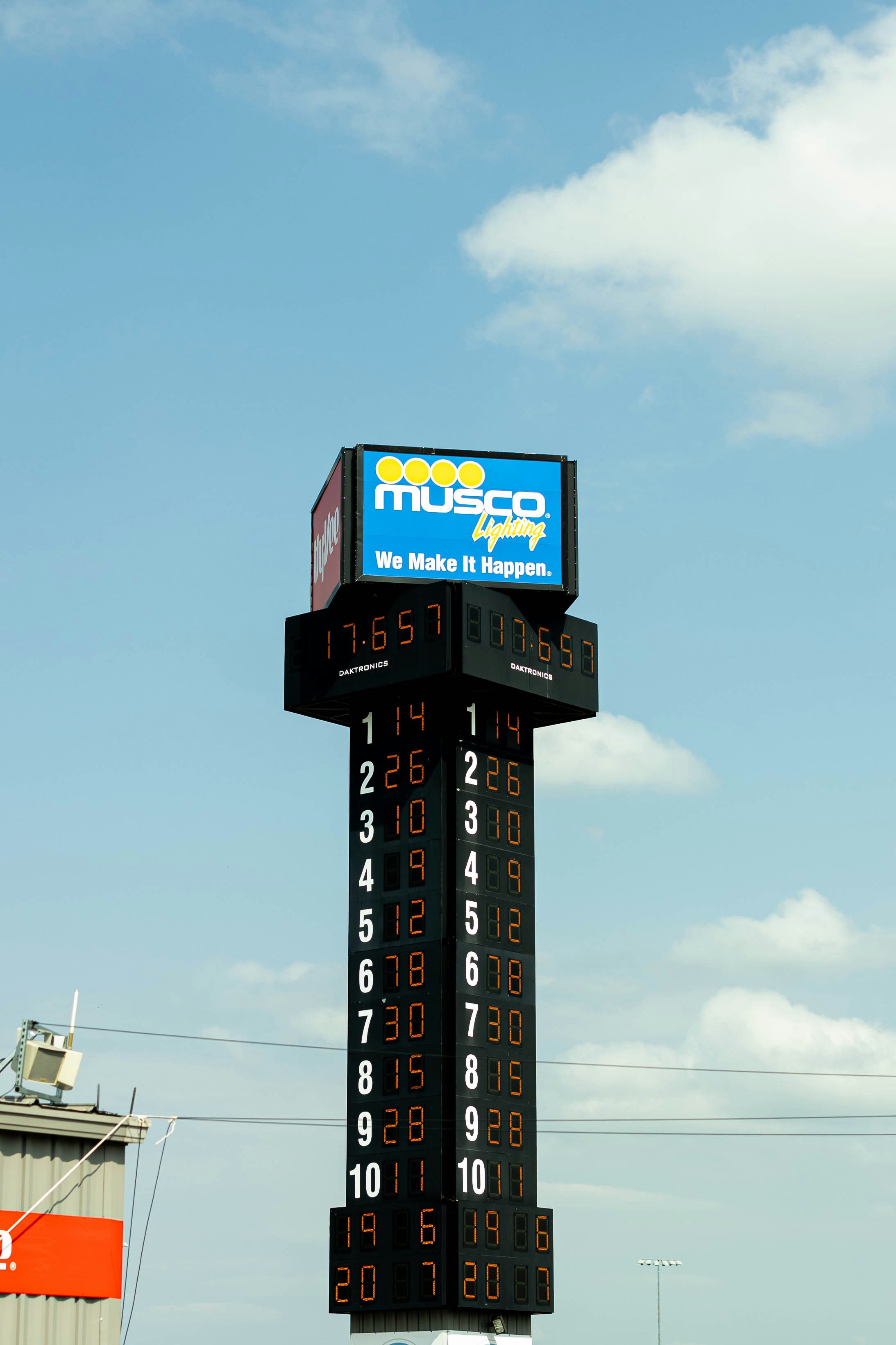A tall clock tower with a sky in the background