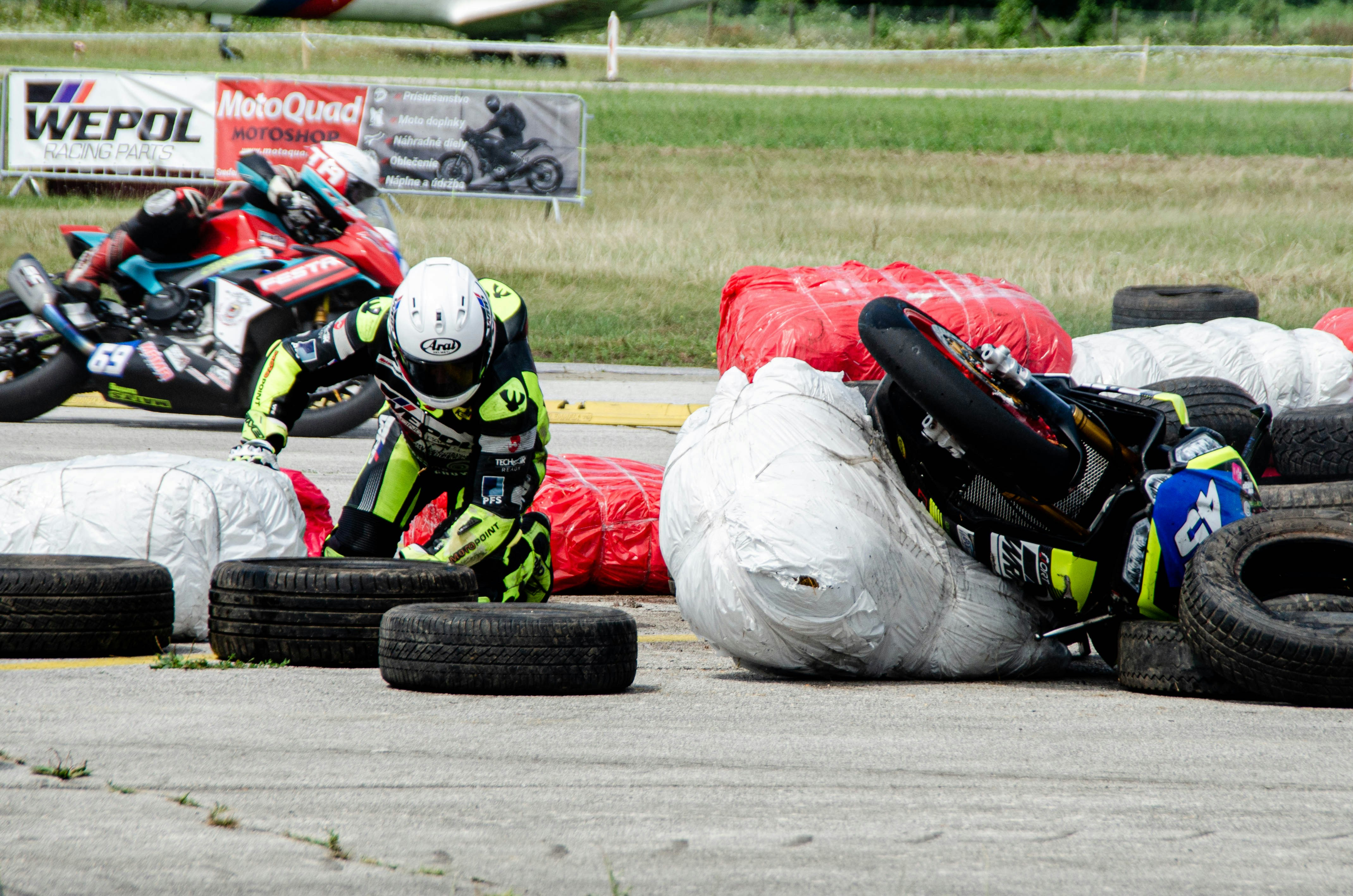 A group of motorcyclists on a race track
