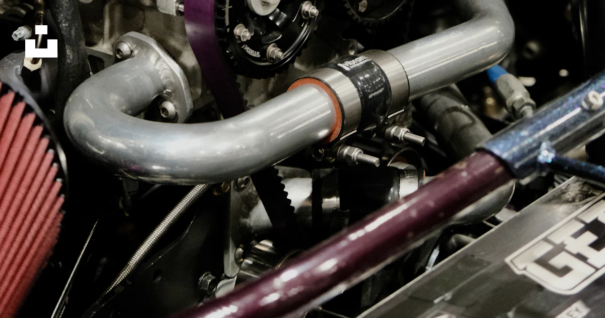 Engine Inhale A close up of a car's engine and its intake photo – Free Motor Image on ...