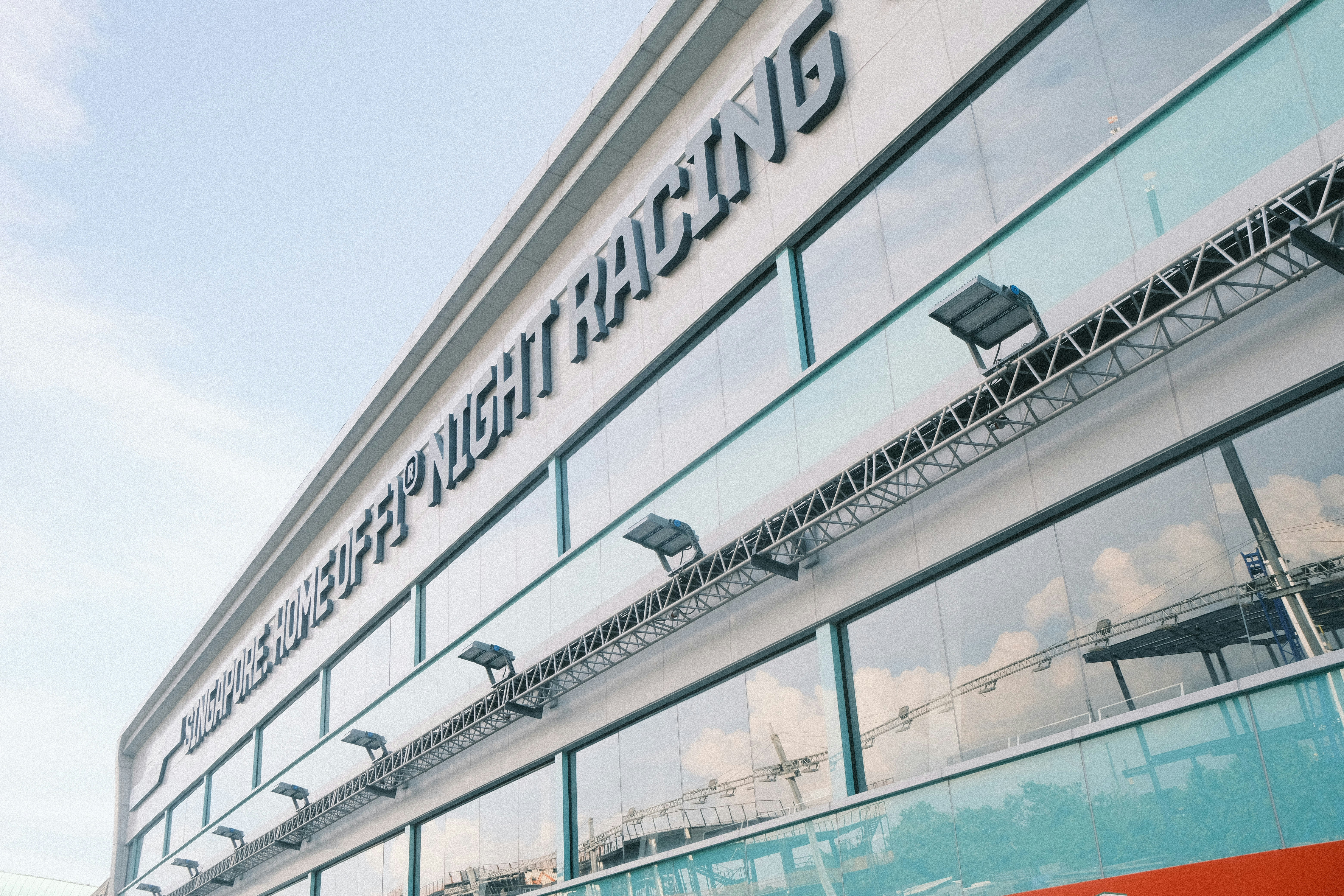 A large building with a sign on the side of it