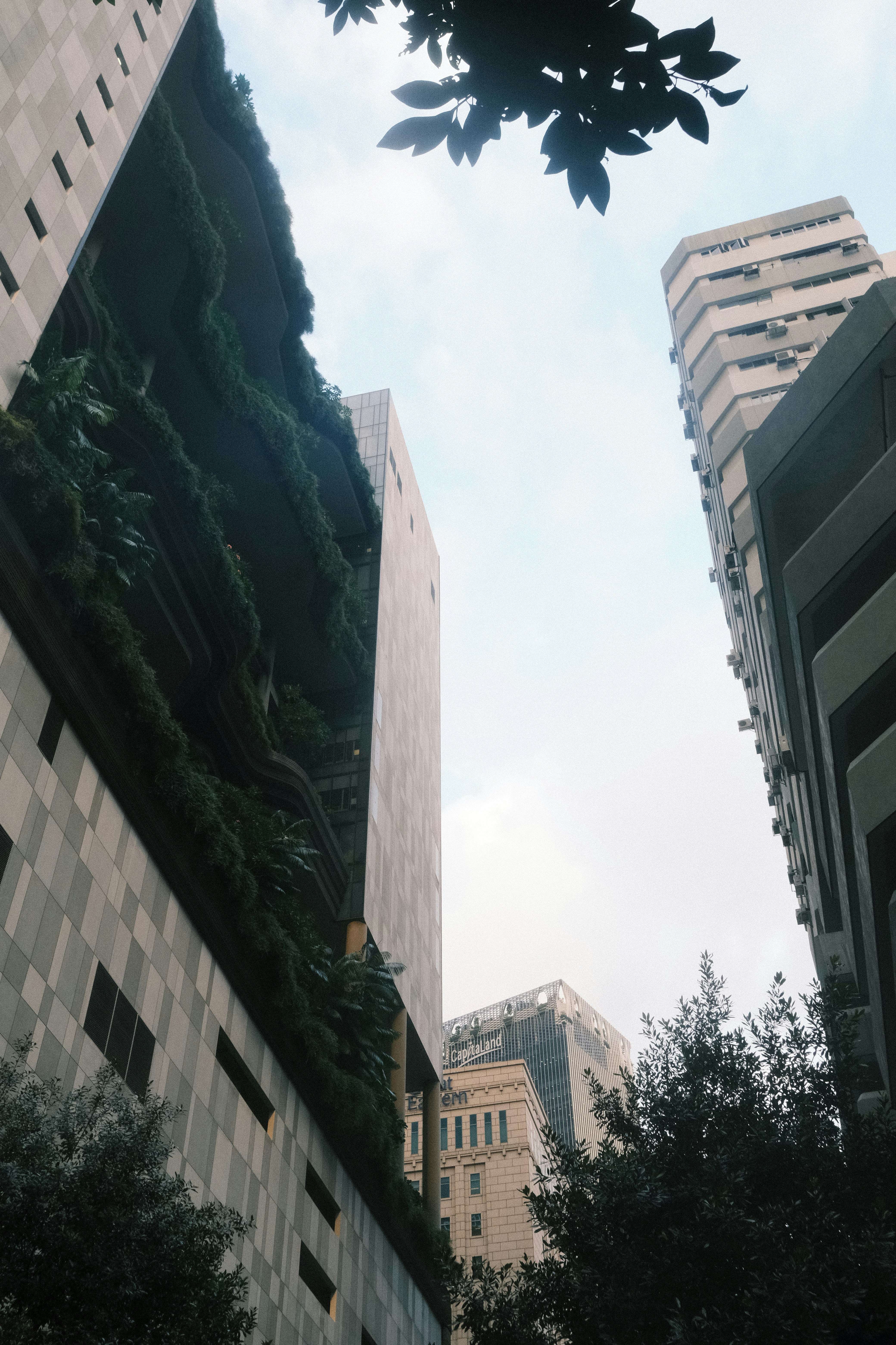 A couple of tall buildings sitting next to each other