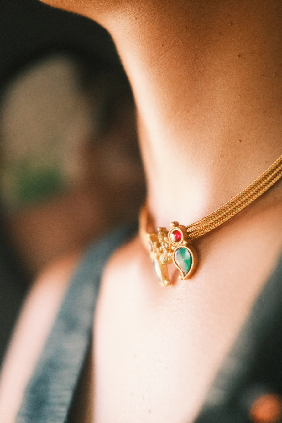Gold gemstone necklace close-up