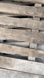 A close up of a bunch of wooden pallets