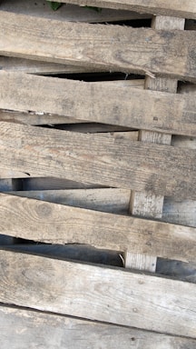 A close up of a bunch of wooden pallets