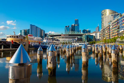 A body of water surrounded by tall buildings