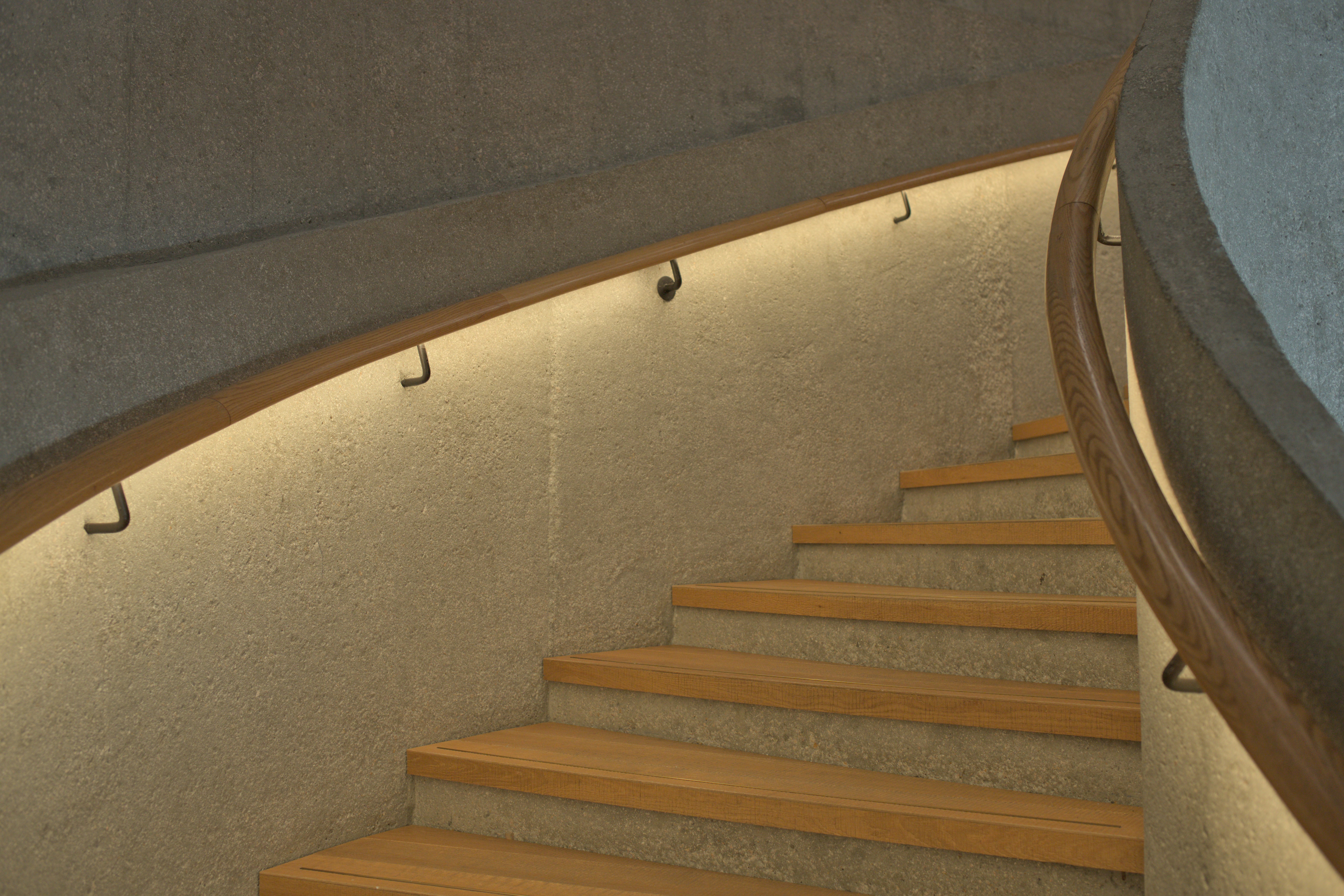 A set of stairs leading up to the top of a building