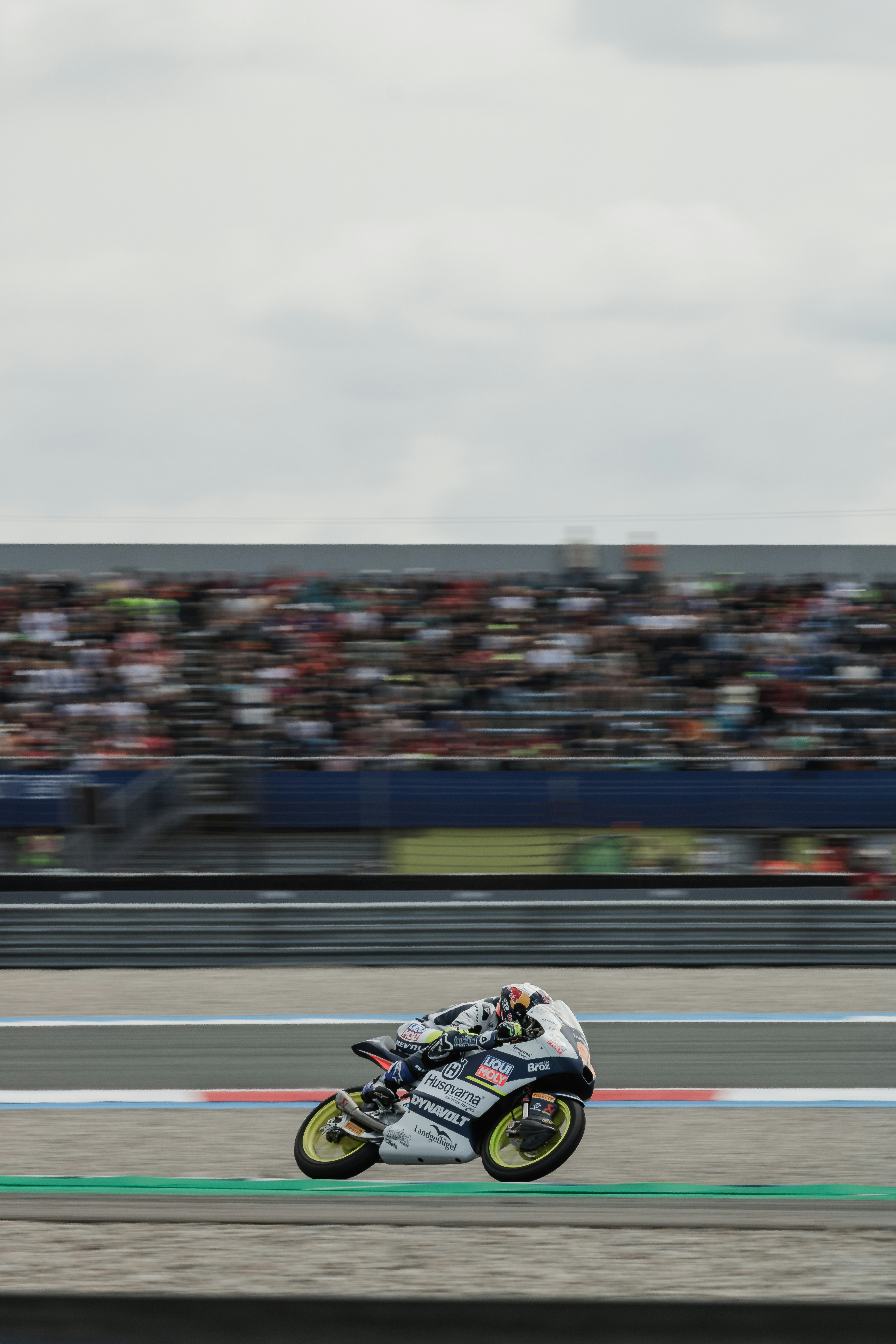 A person riding a motorcycle on a race track