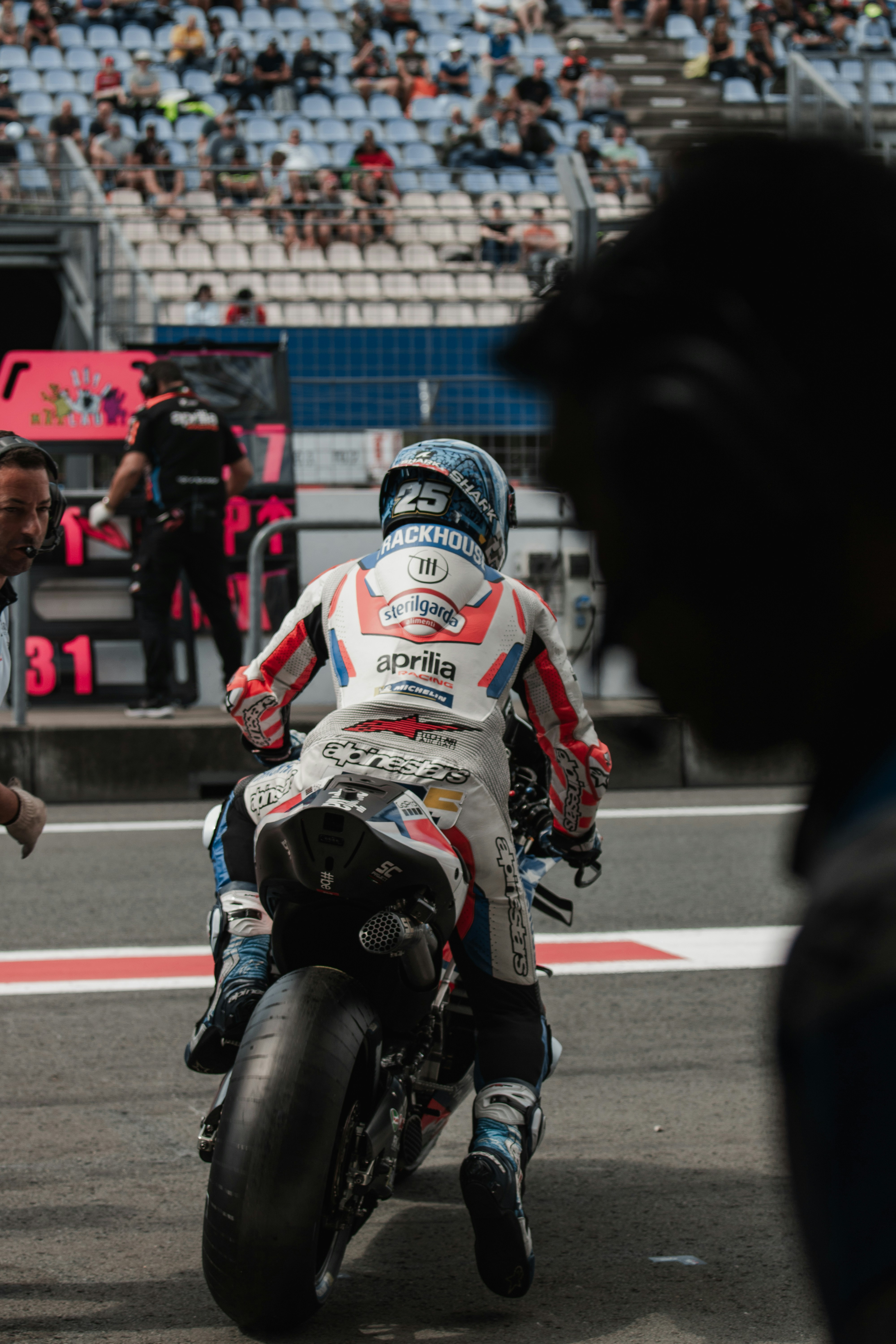 A person riding a motorcycle on a race track