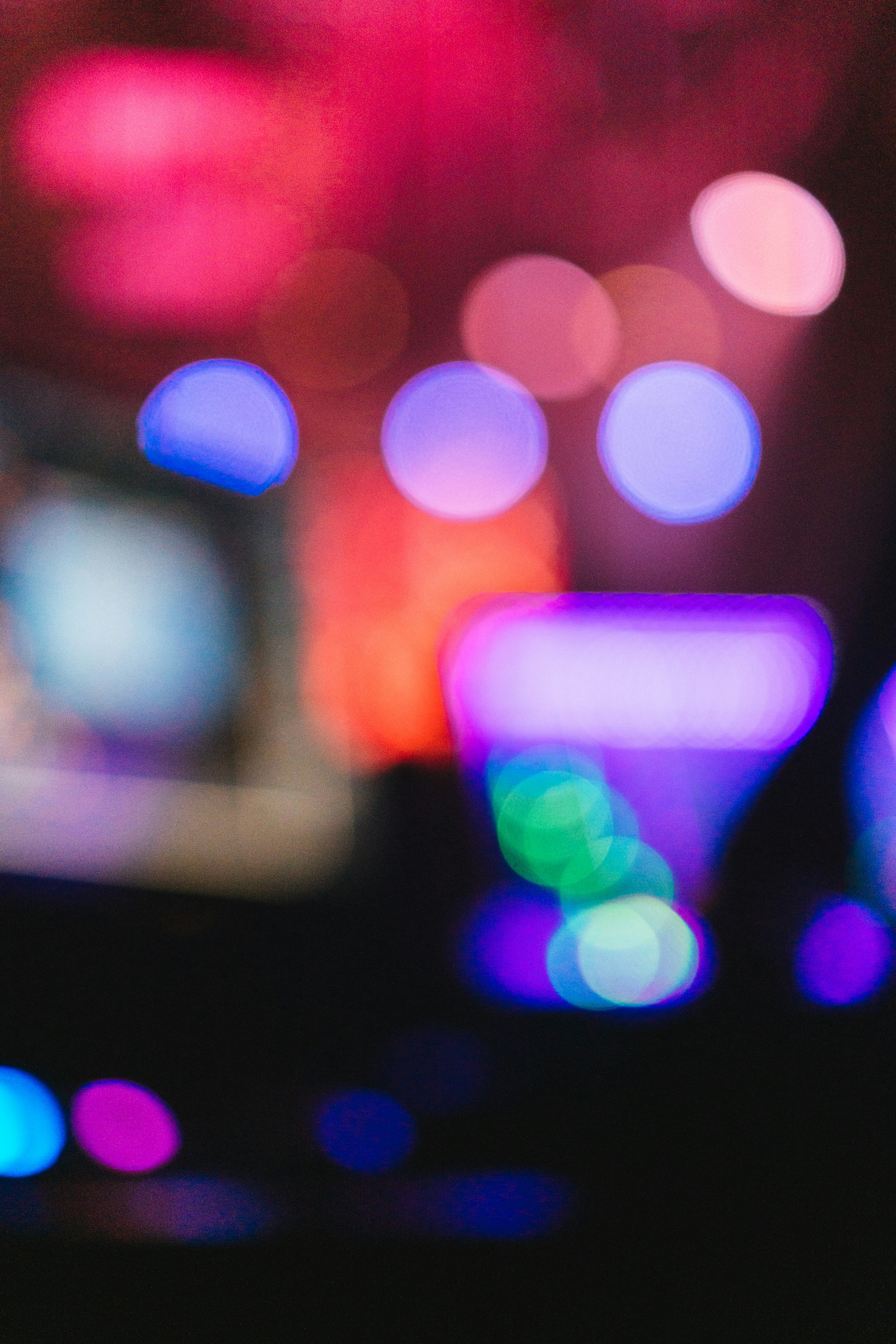 A blurry photo of a cell phone with a blurry background