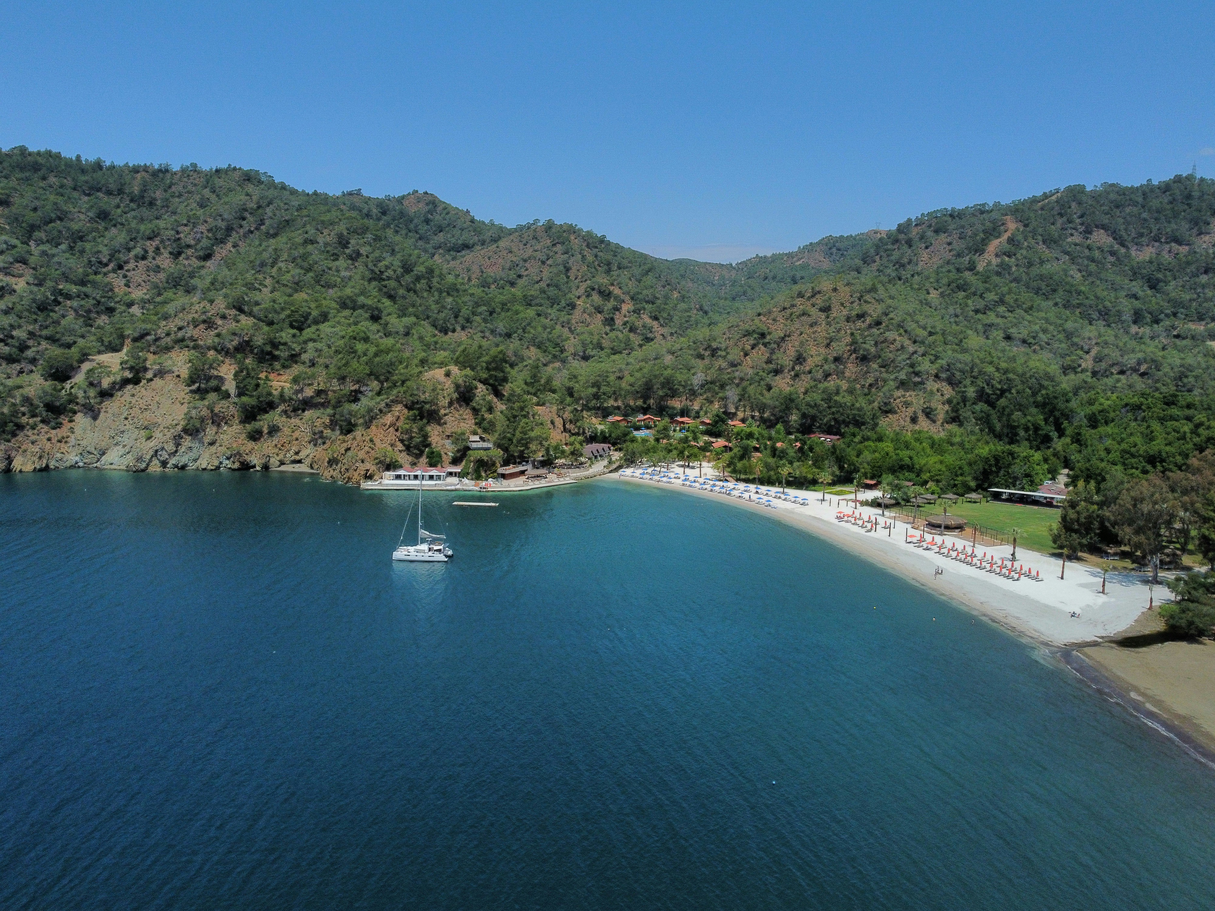 A large body of water surrounded by mountains
