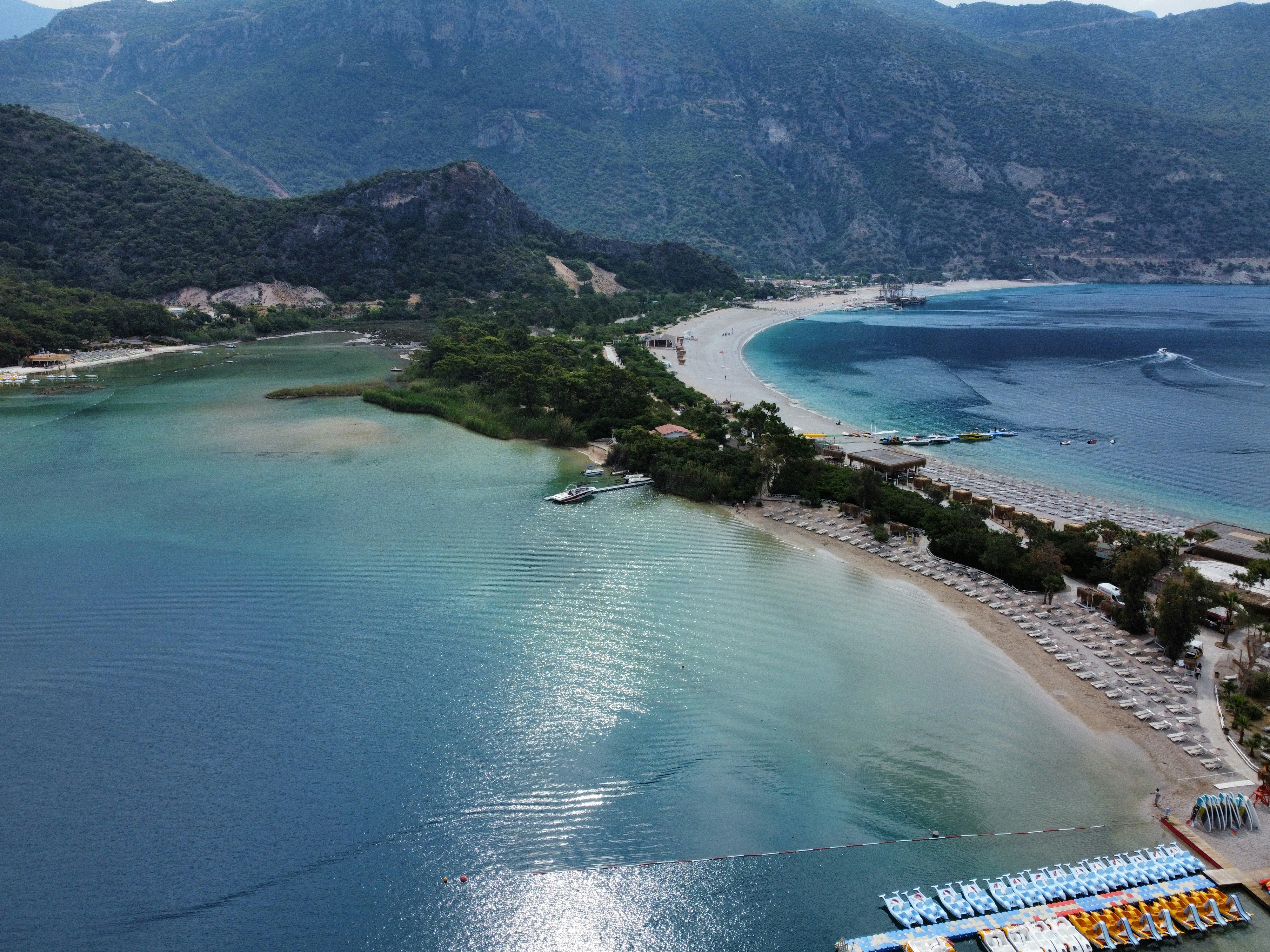 A large body of water surrounded by mountains