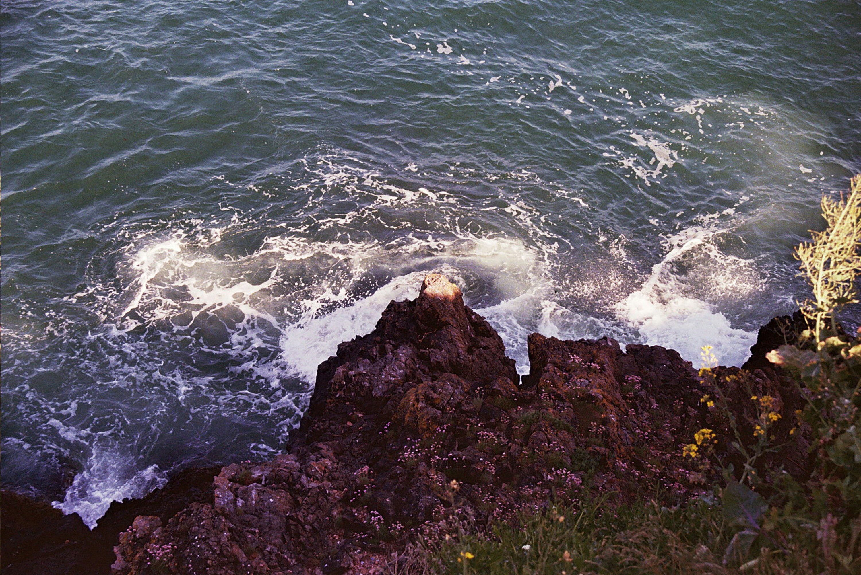 A view of a body of water from a cliff