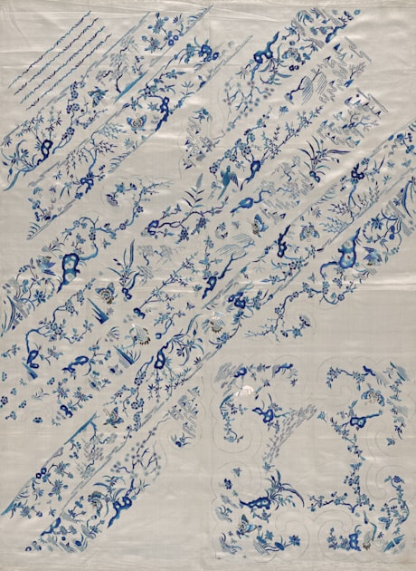 Blue and white patterns on paper — the horizontal geometric grammar that connects Tang Dynasty decorative arts to the bread bag's structural philosophy.