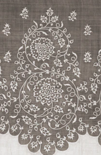 Intricate floral pattern on a textured fabric