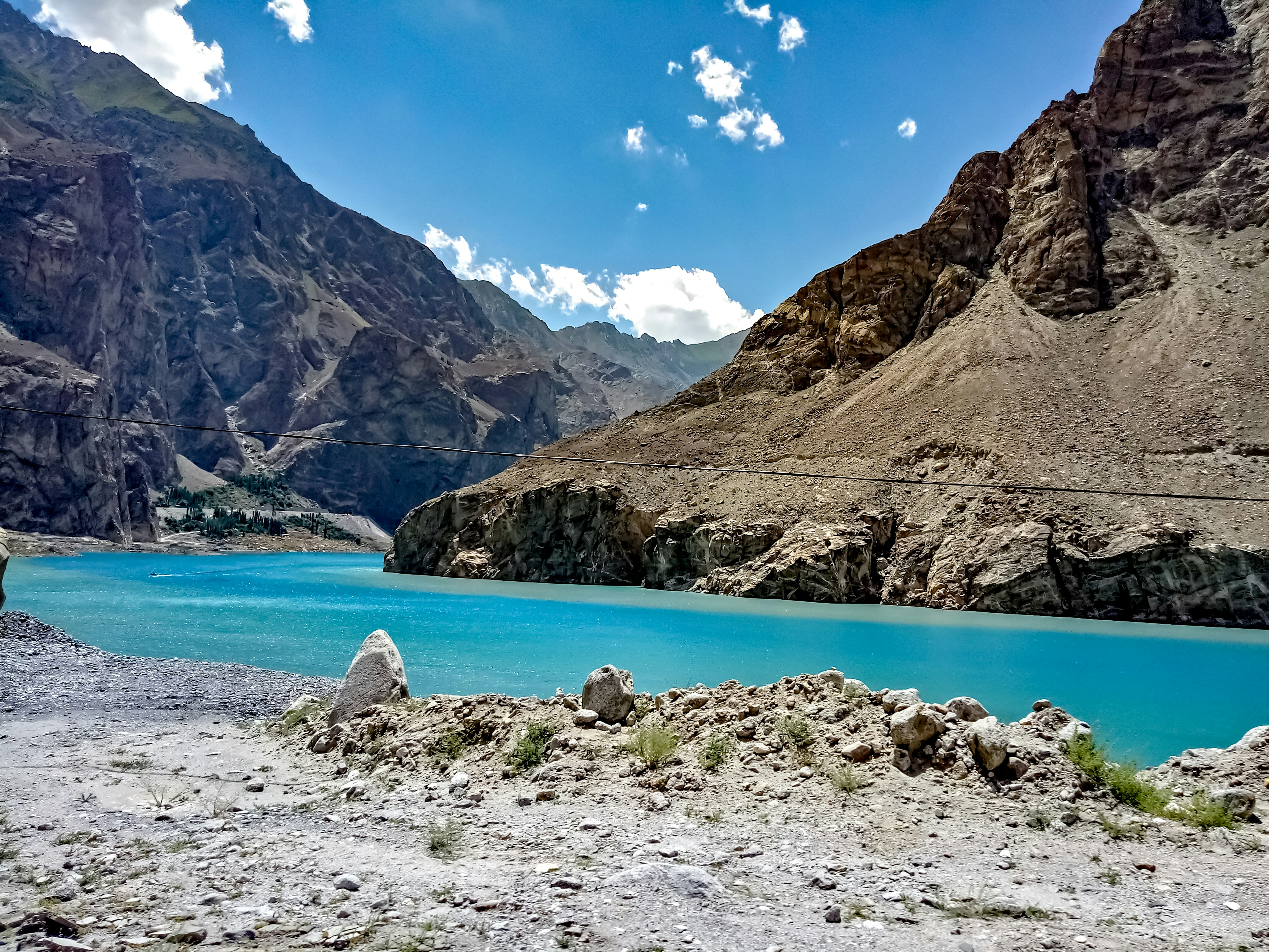 A large body of water surrounded by mountains