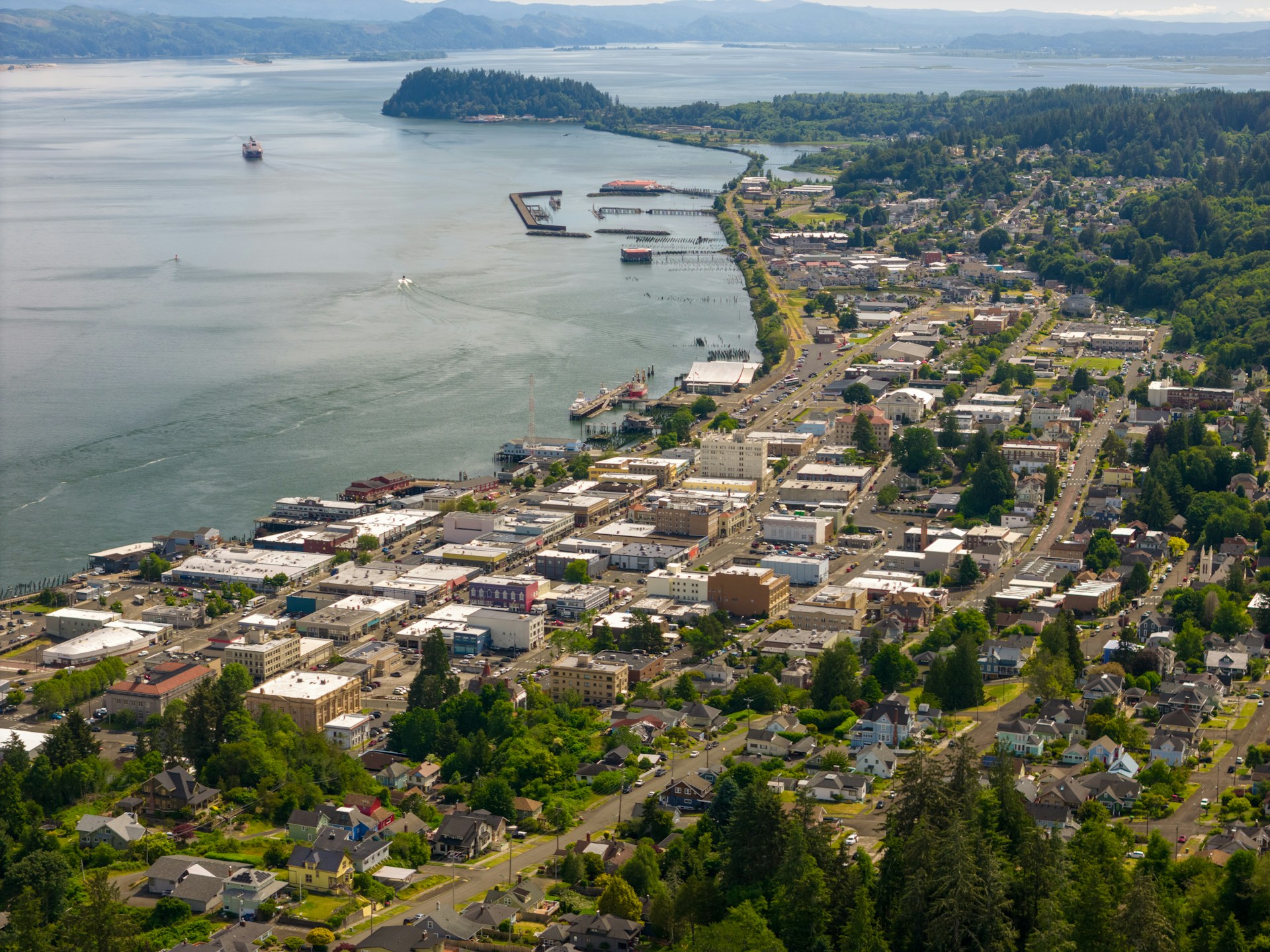 An aerial view of a city and a body of water