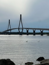 A large bridge over a large body of water