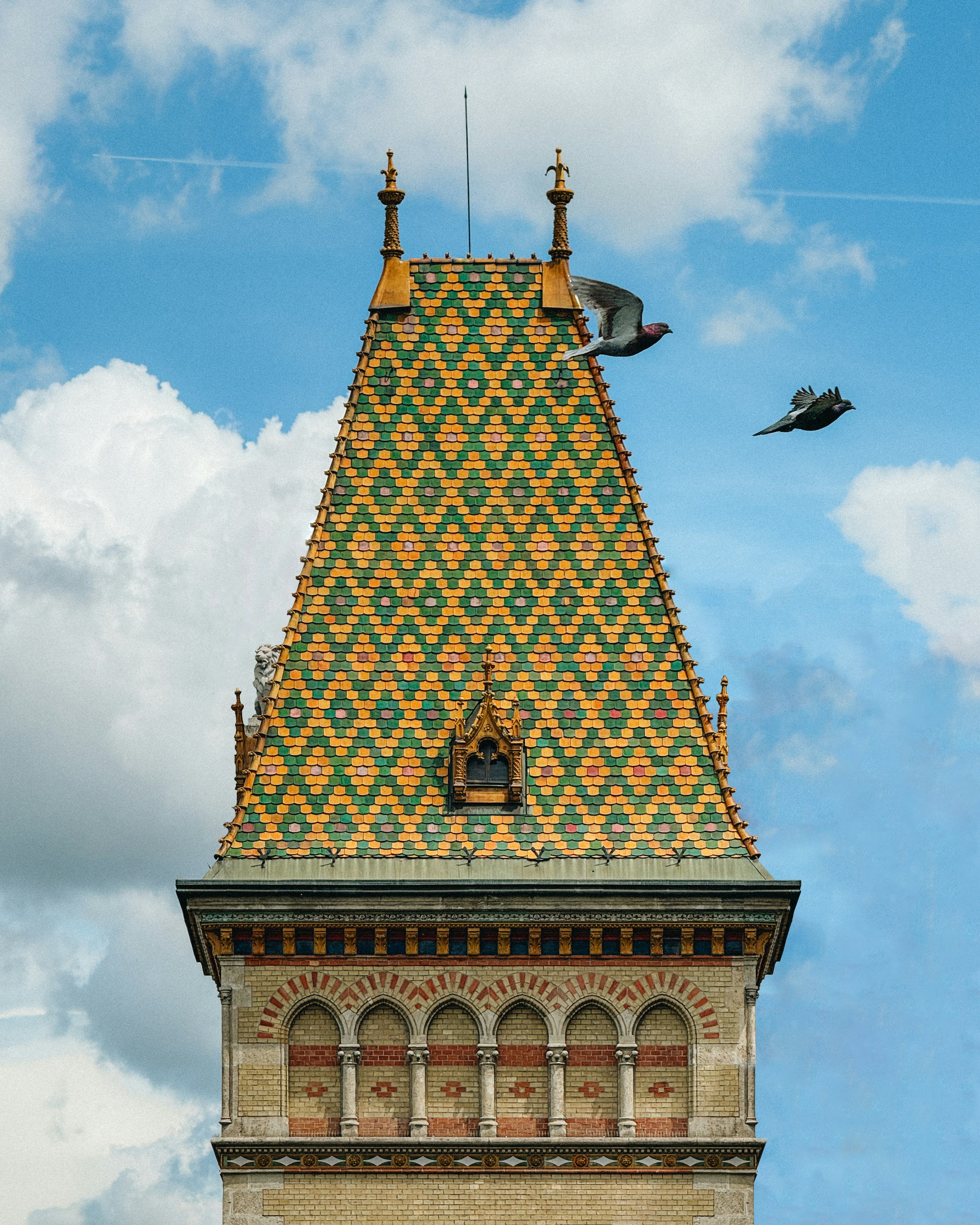 A tall tower with a clock on the top of it