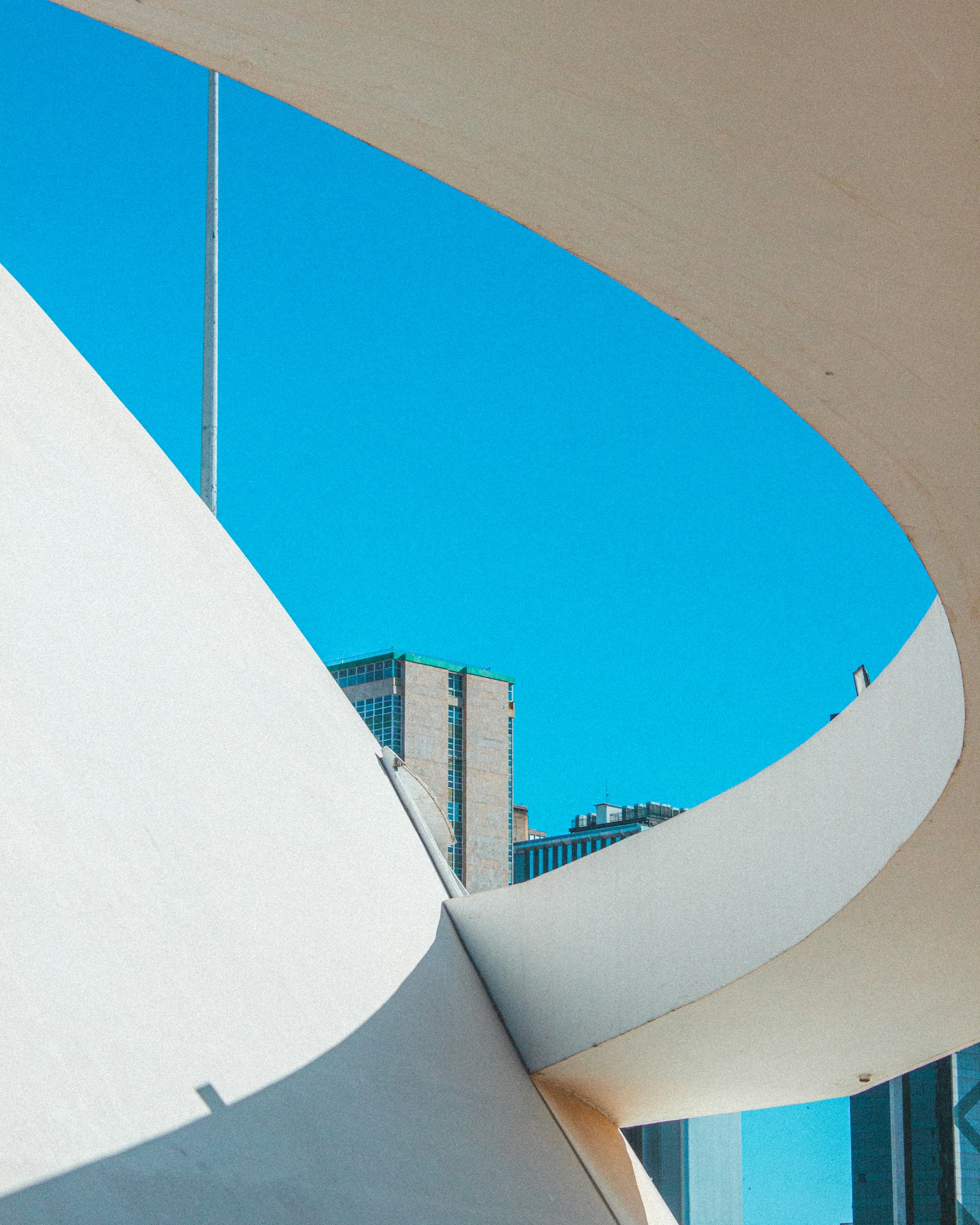 A skateboarder is doing a trick on a ramp
