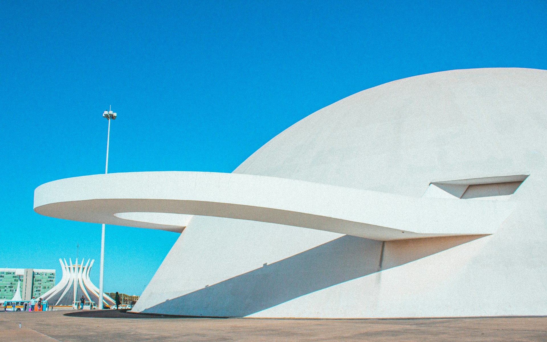 A large white building with a curved roof