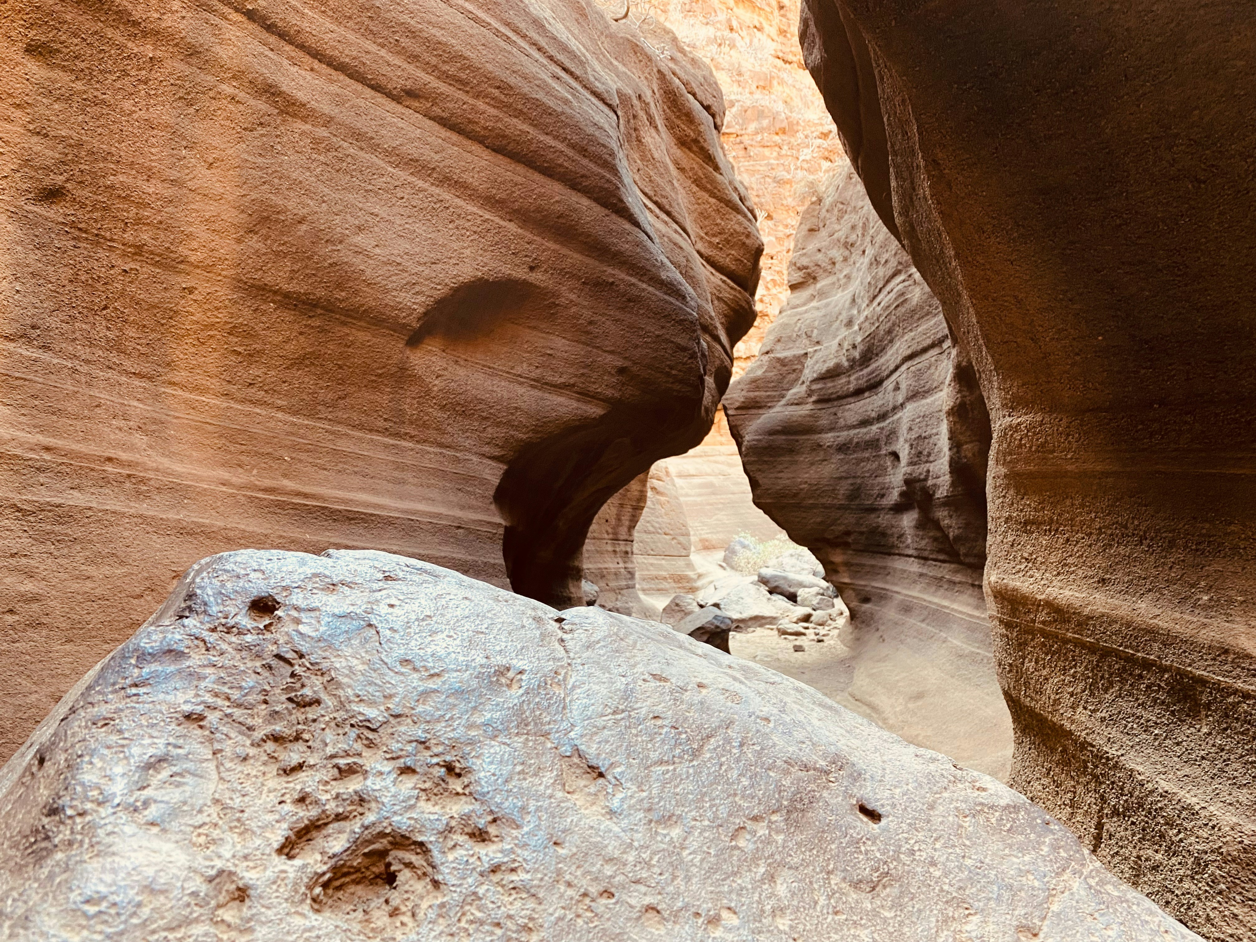 A narrow slot in the side of a mountain