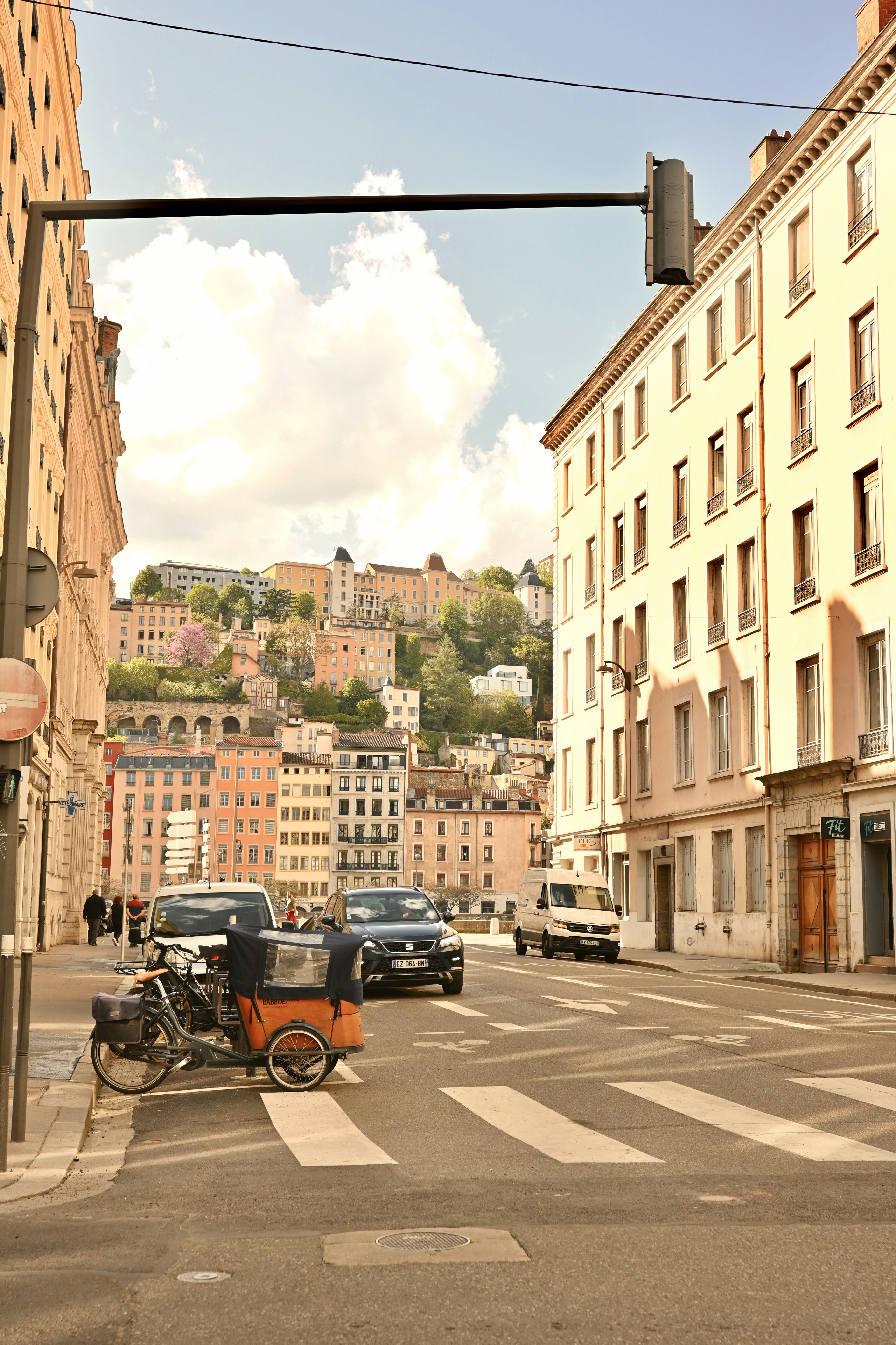 A city street filled with lots of tall buildings