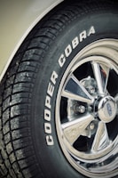 A close up of a tire on a car