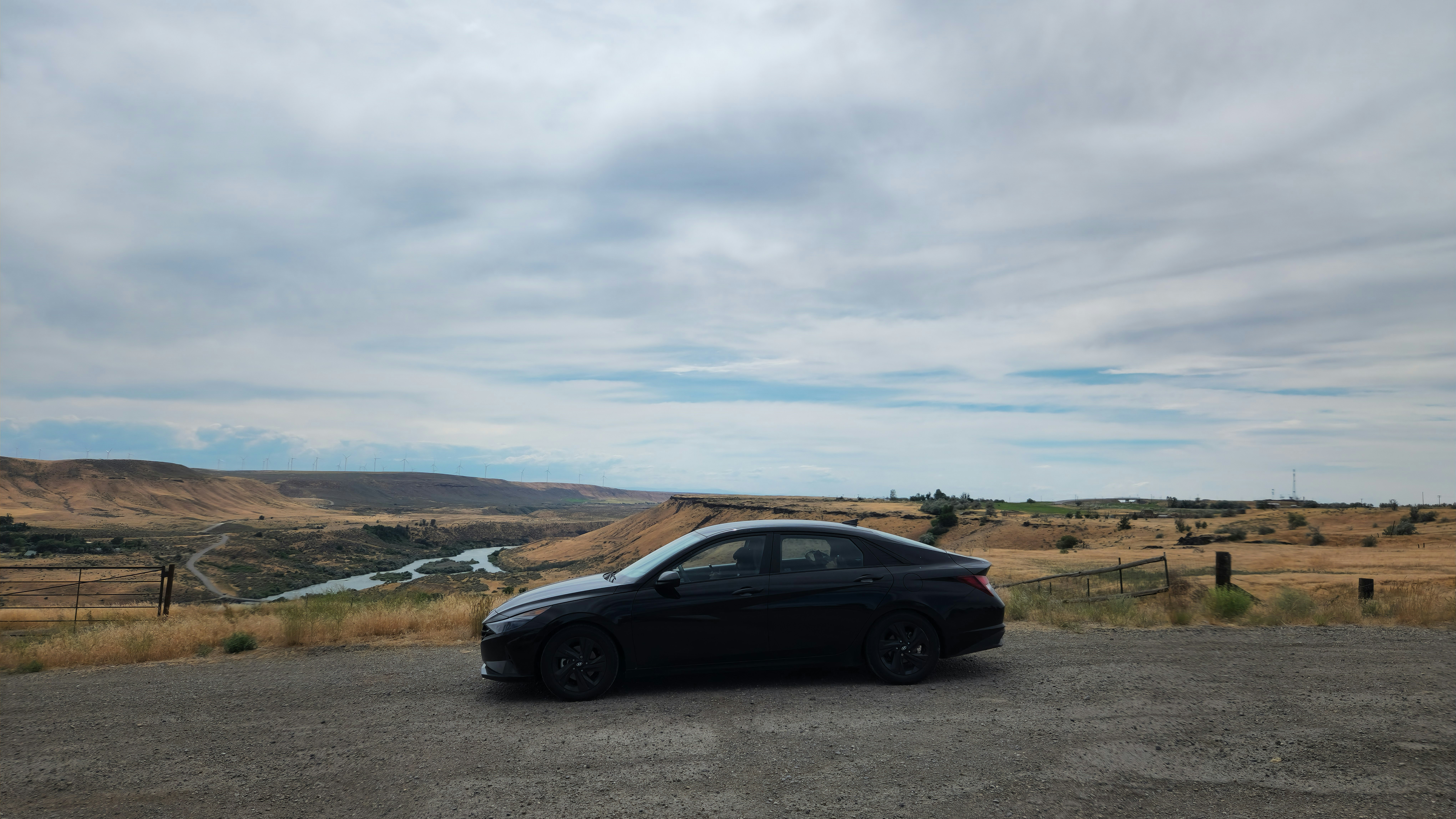 A car is parked on the side of the road