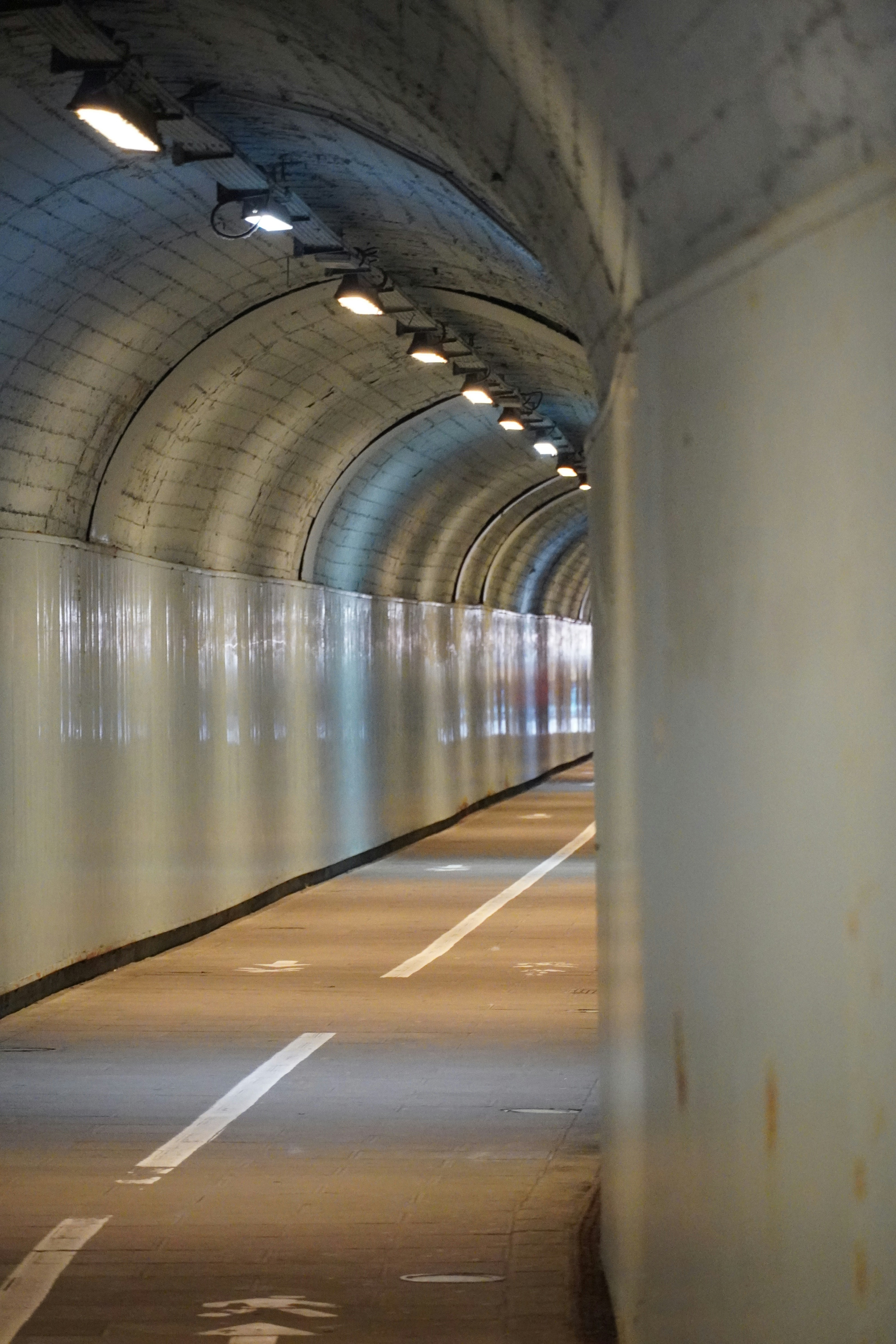 A long tunnel with a light at the end