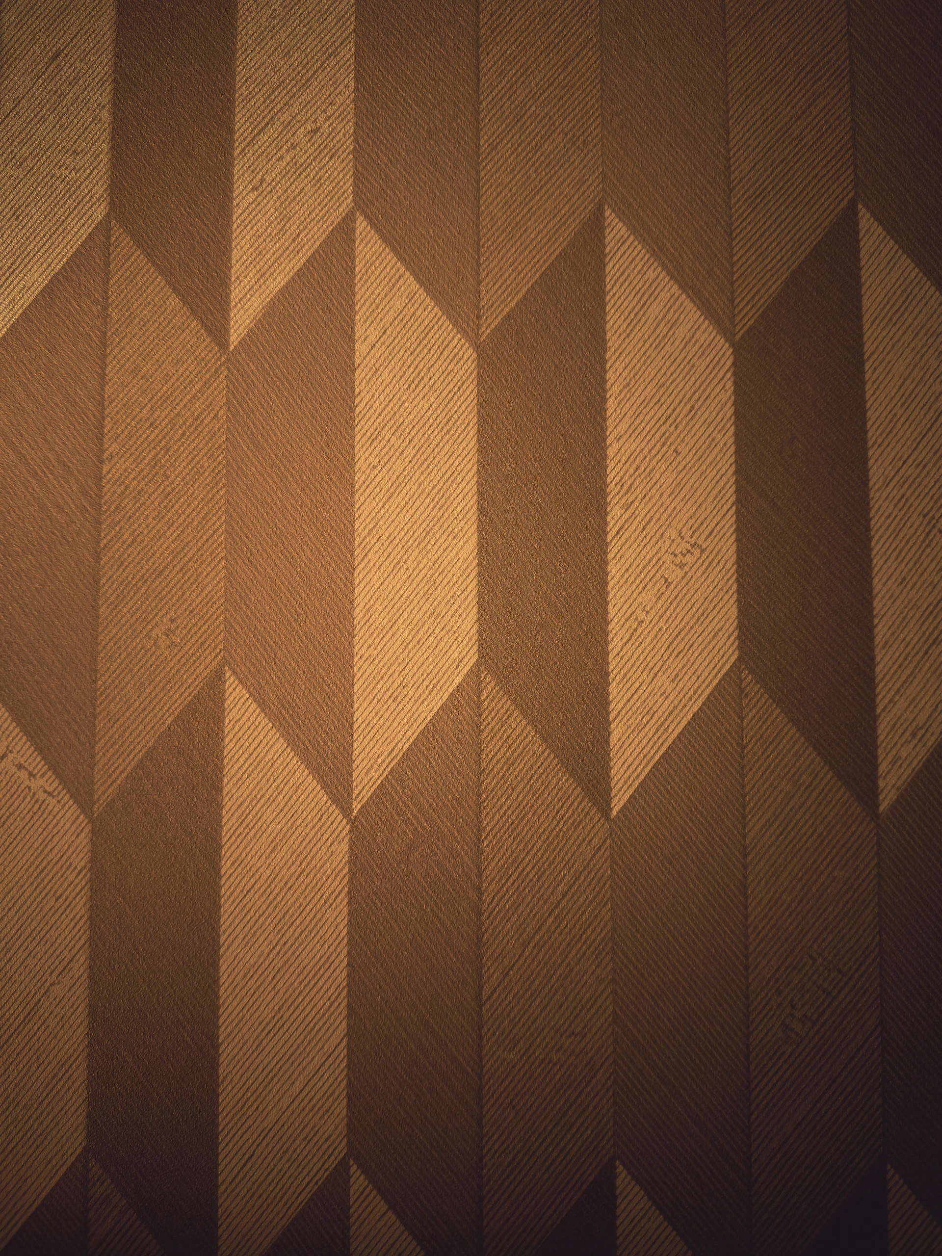 A close up of a wall with a pattern on it